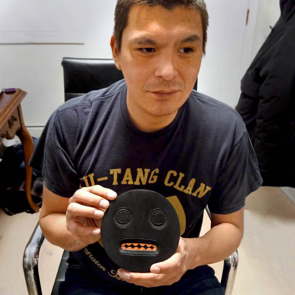 Allan Weird with Haida Fungus Man carving