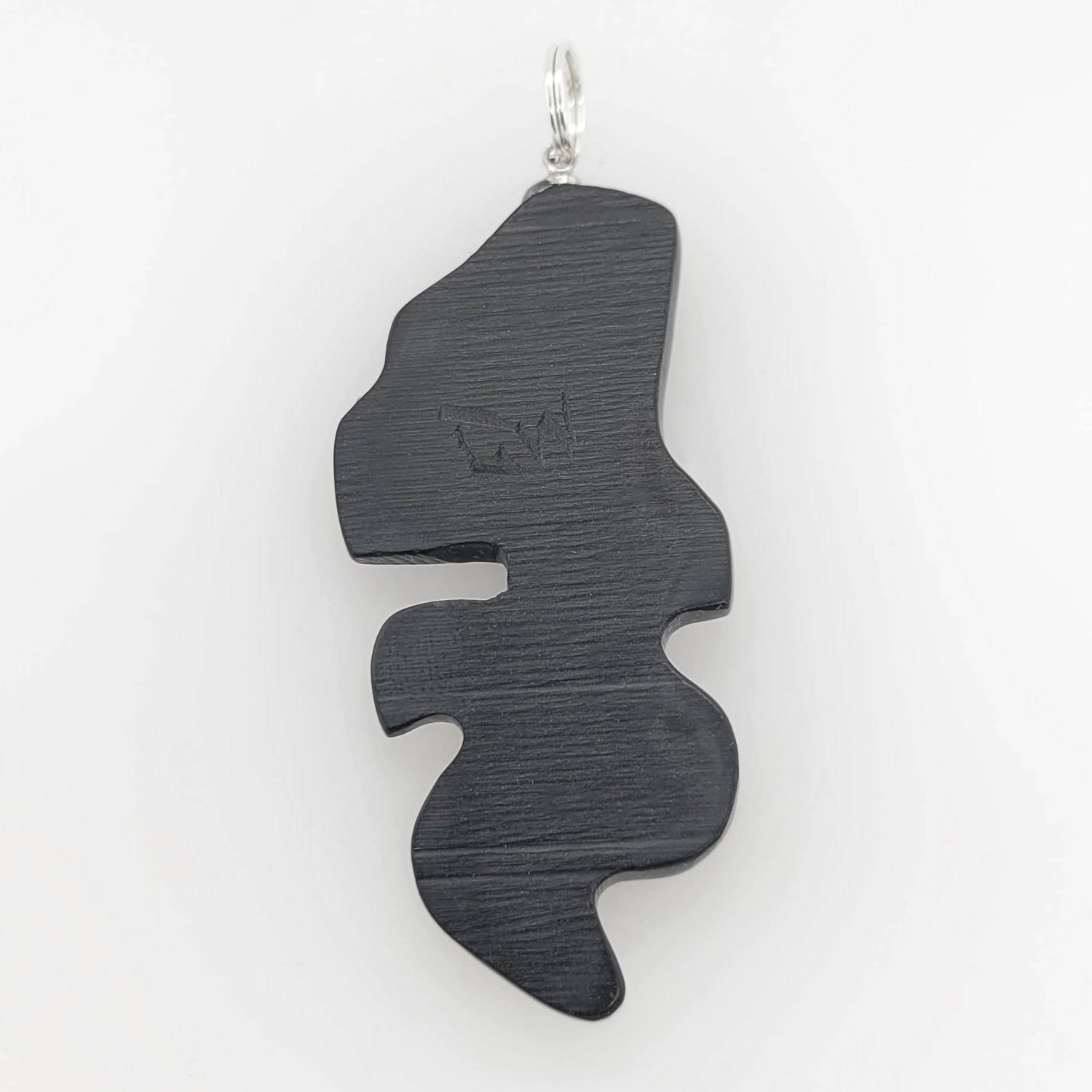 Argillite Transforming Killer Whale Pendant by Haida artist Gryn White