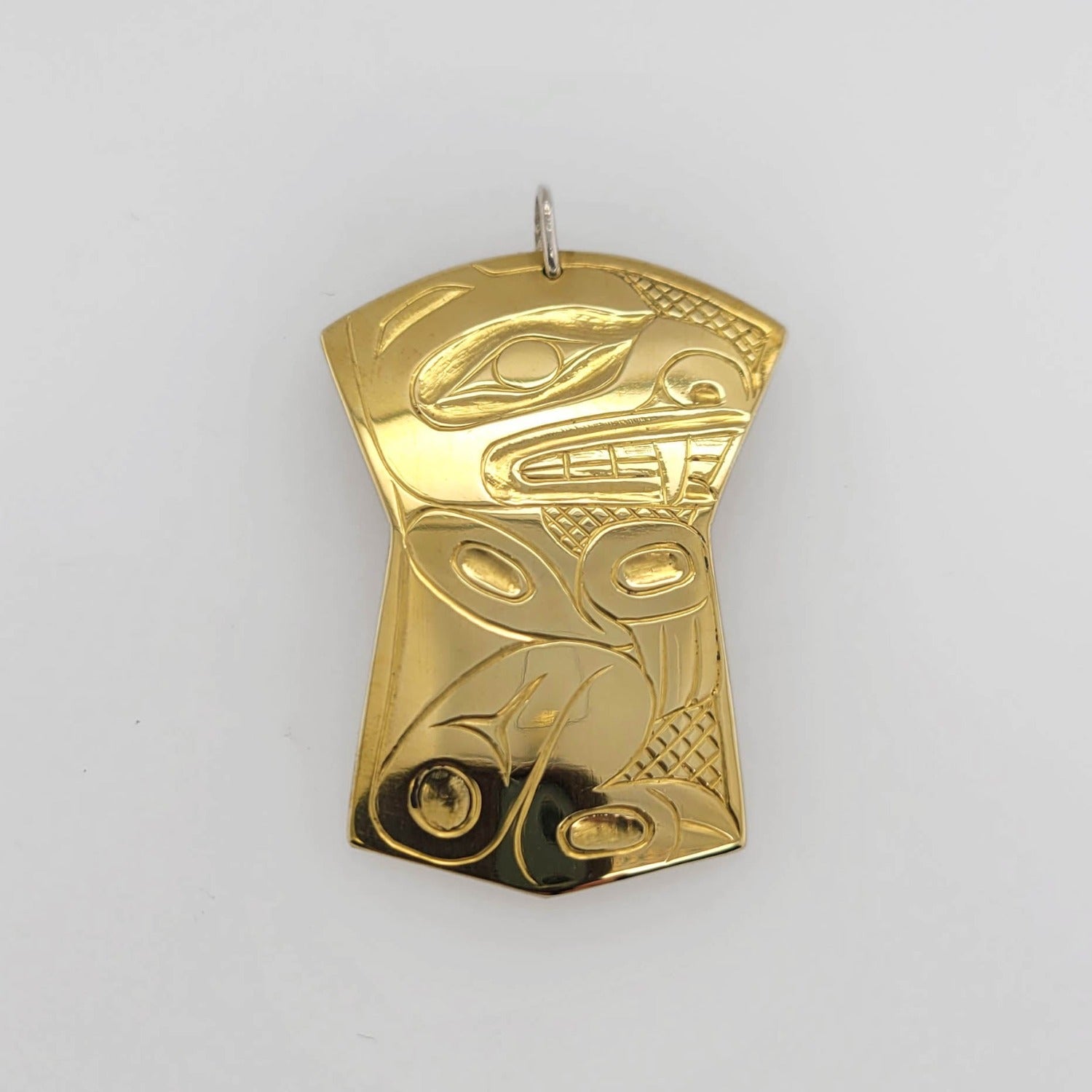 Indigenous Brass Bear Pendant by Haida artist Derek White