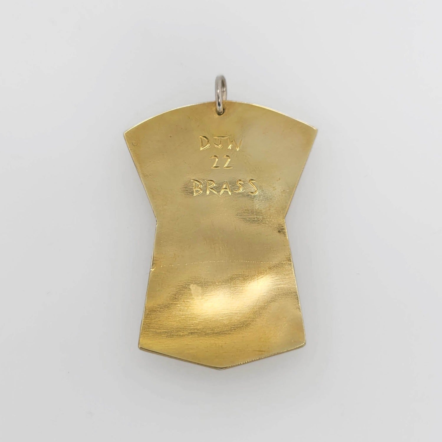 Indigenous Brass Hummingbird Pendant by Haida artist Derek White