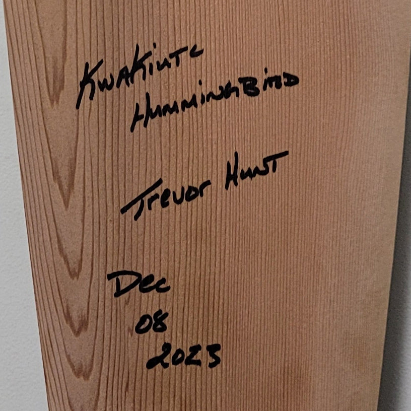 Carved Hummingbird Paddle by Kwakiutl carver Trevor Hunt