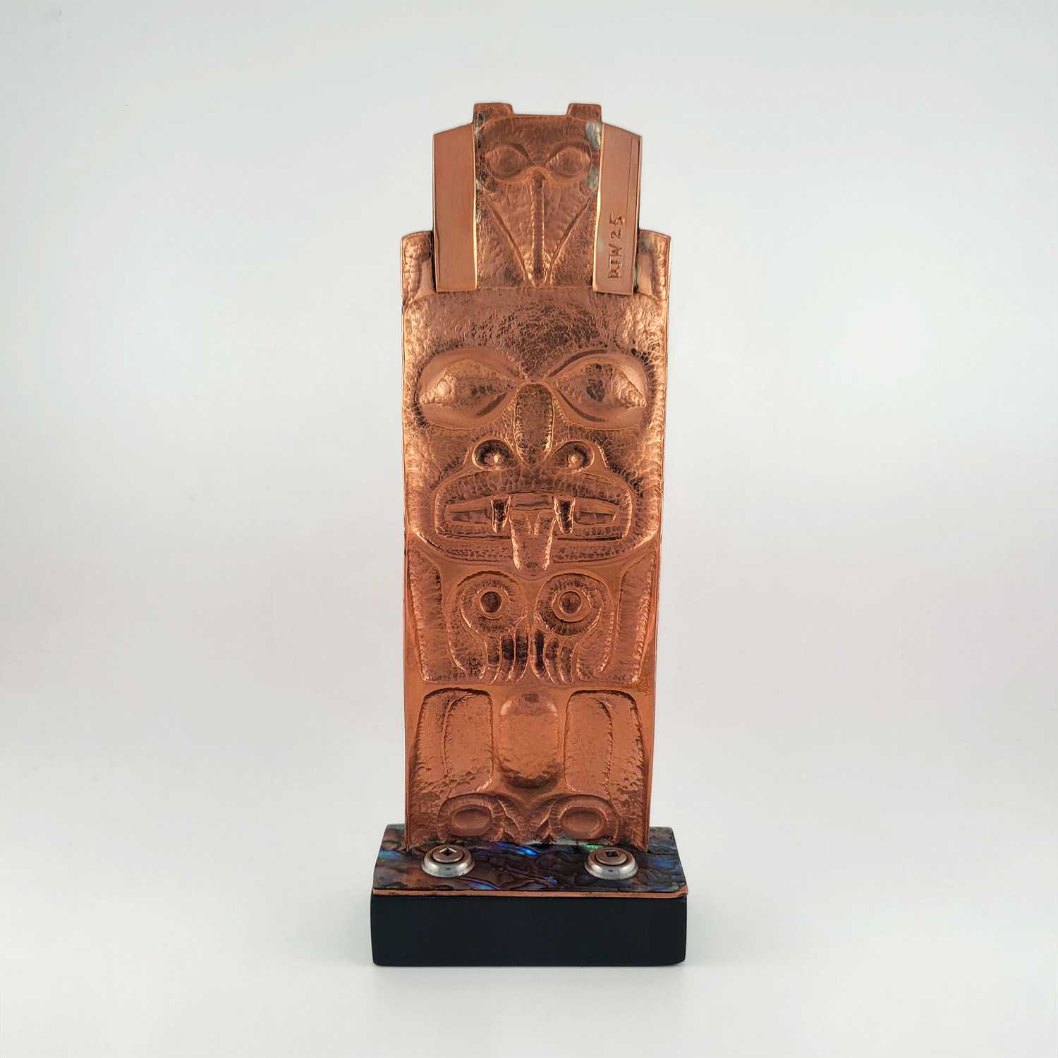 Copper Repousse Totem Pole by Haida artist Derek White