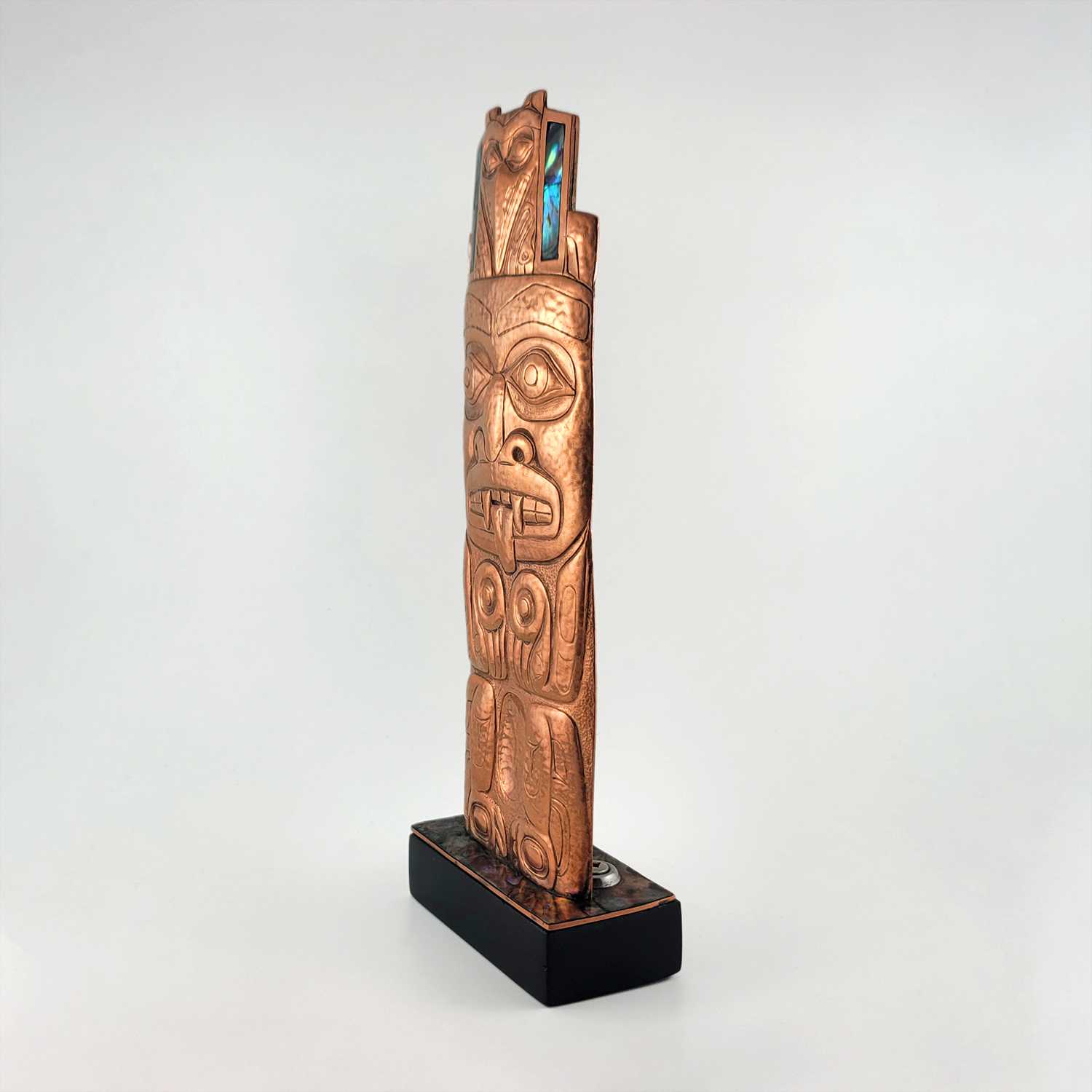 Copper Repousse Totem Pole by Haida artist Derek White