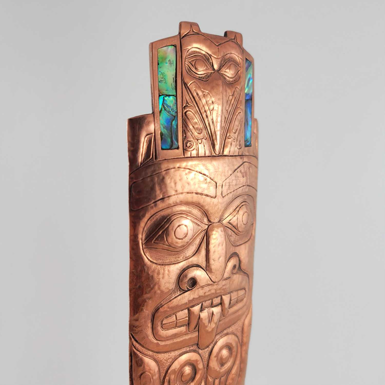 Copper Repousse Totem Pole by Haida artist Derek White