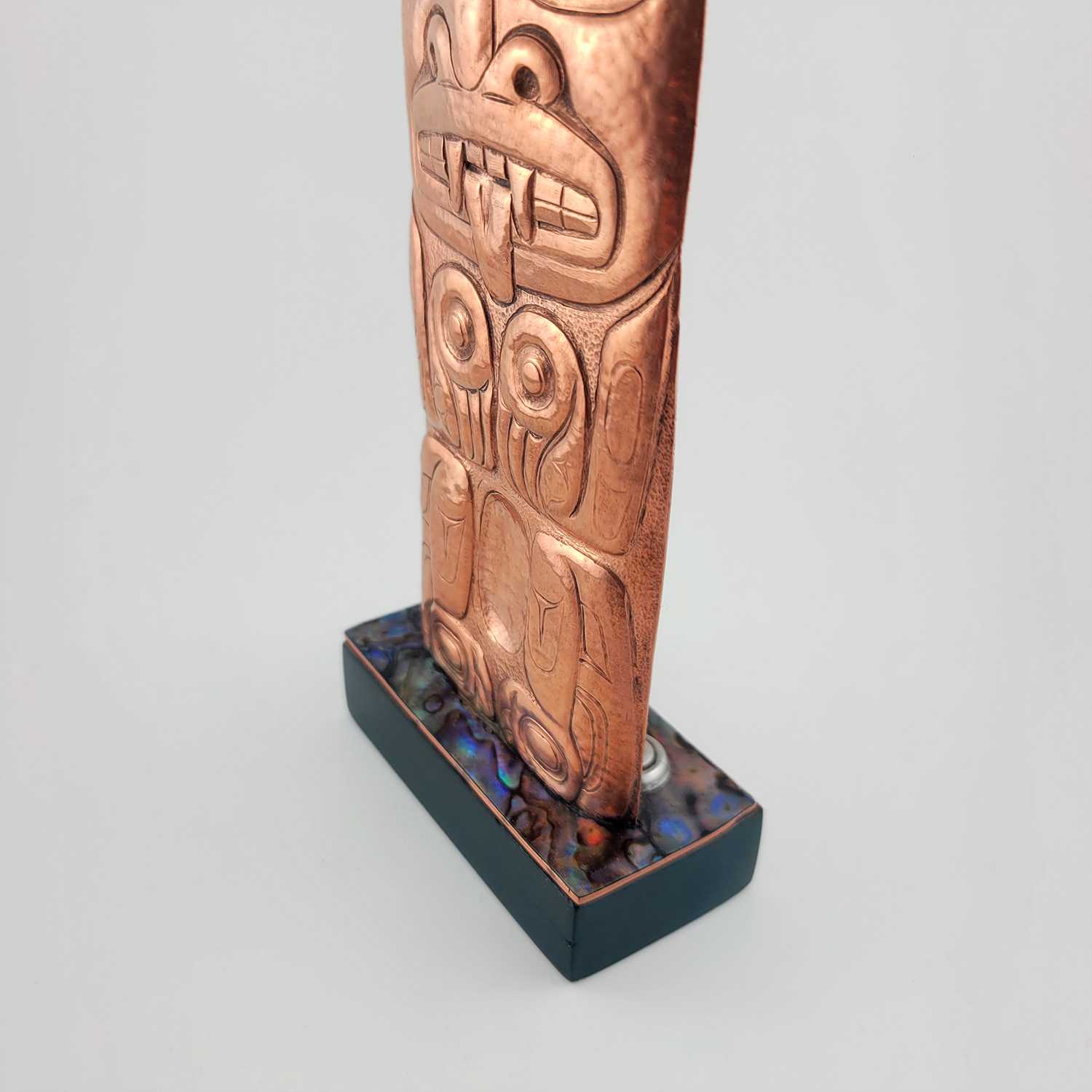 Copper Repousse Totem Pole by Haida artist Derek White
