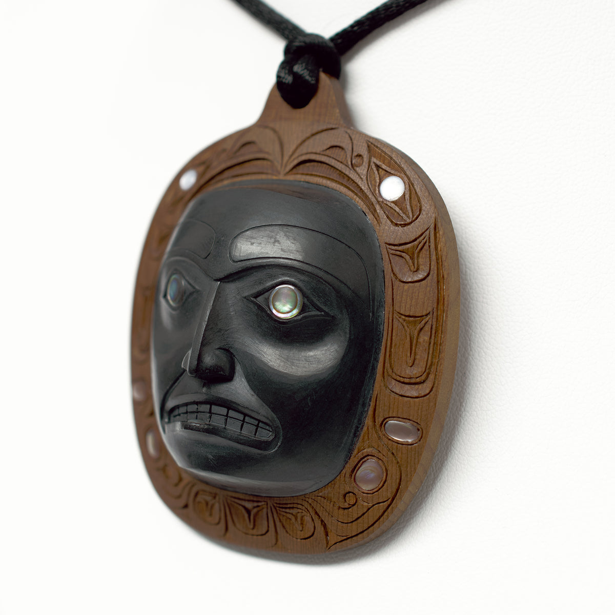 Argillite and Yew Noblewoman Pendant by Haida artist Ron Russ