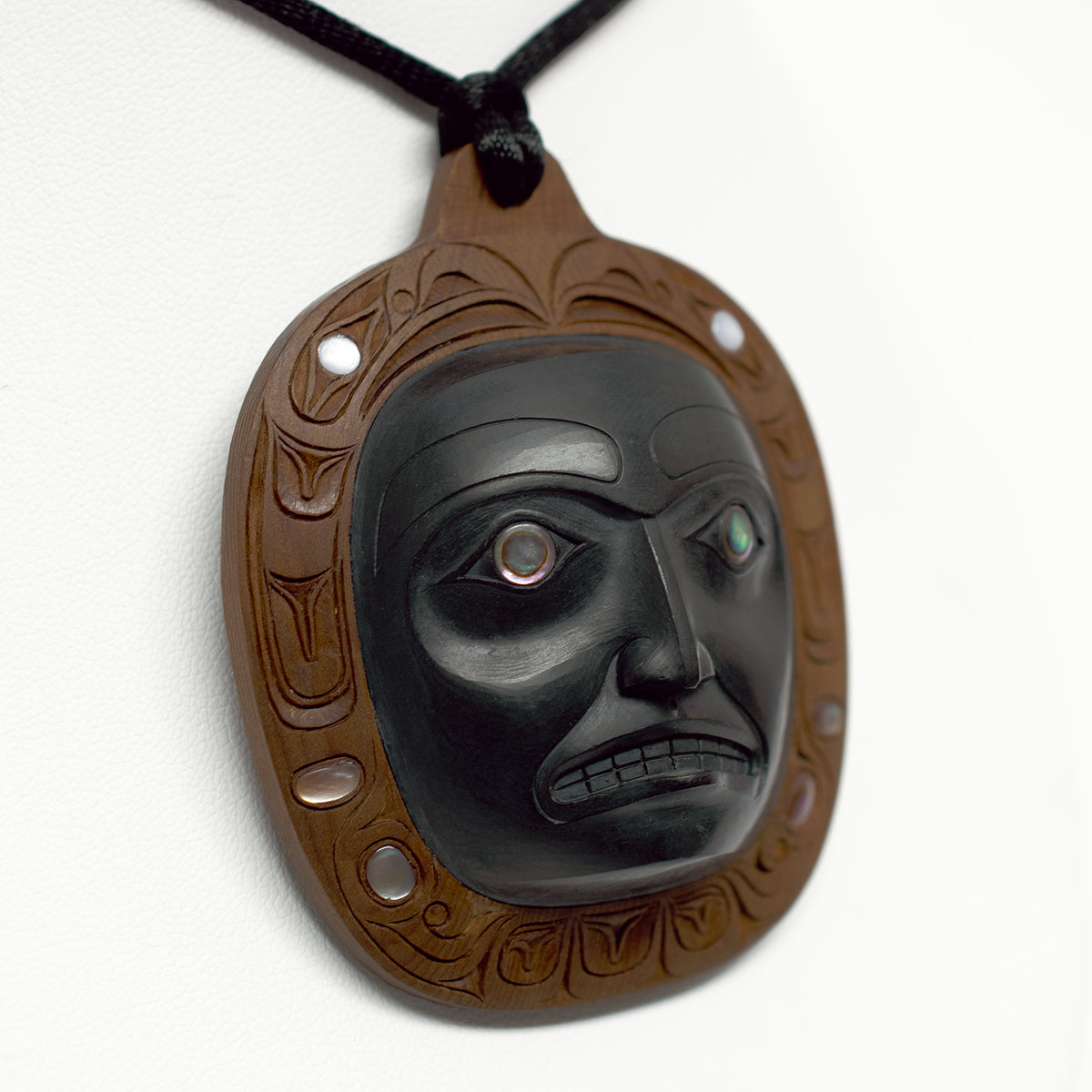Argillite and Yew Noblewoman Pendant by Haida artist Ron Russ
