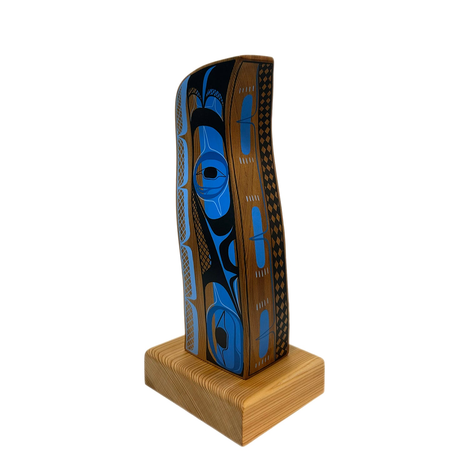 Wooden object with blue and black design on a white background