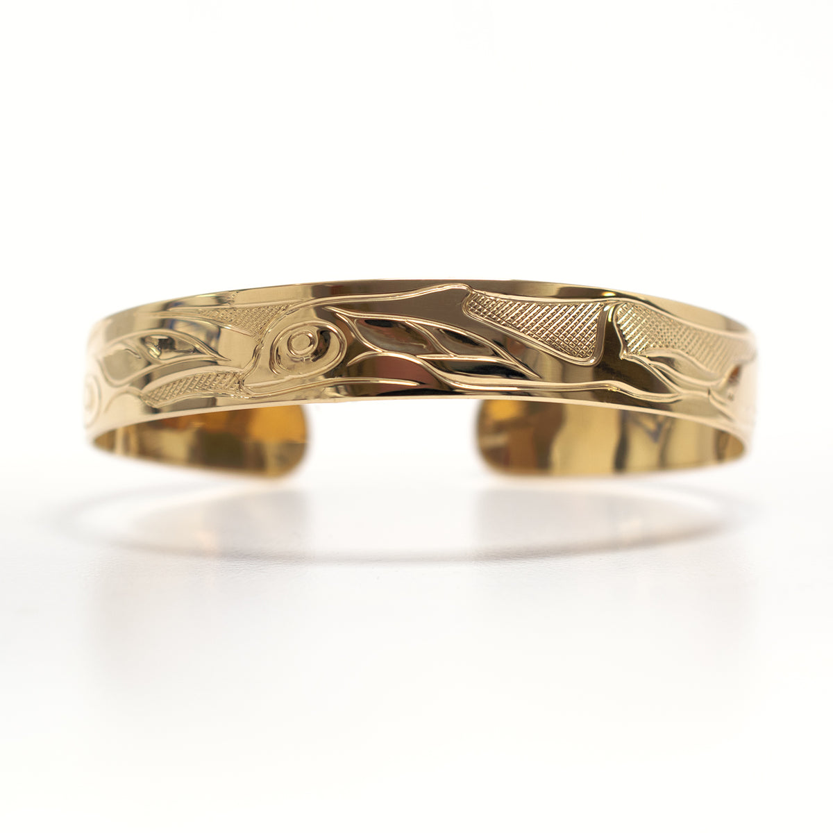 Gold Dolphins Bracelet by Tsimshian artist Bill Helin