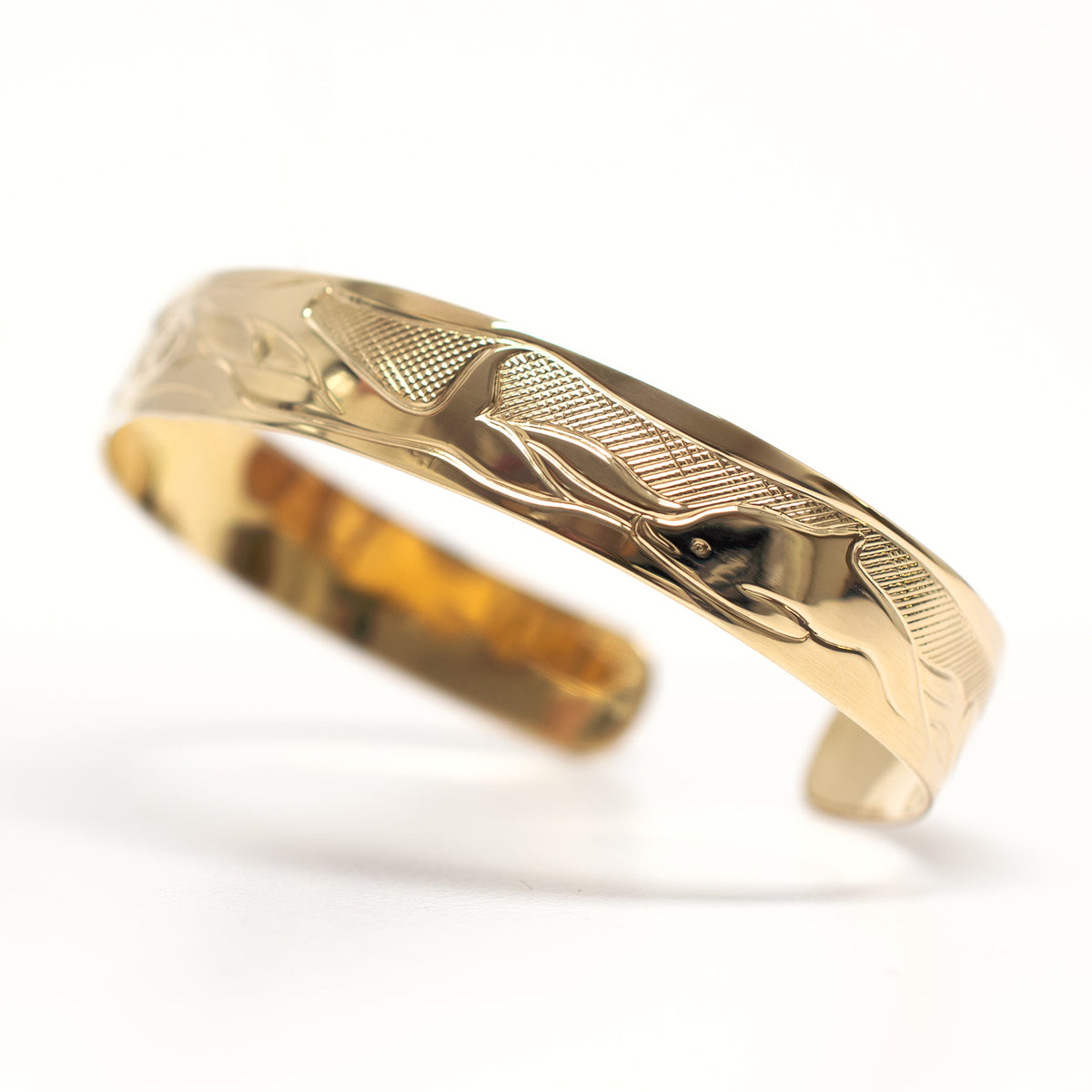Gold Dolphins Bracelet by Tsimshian artist Bill Helin