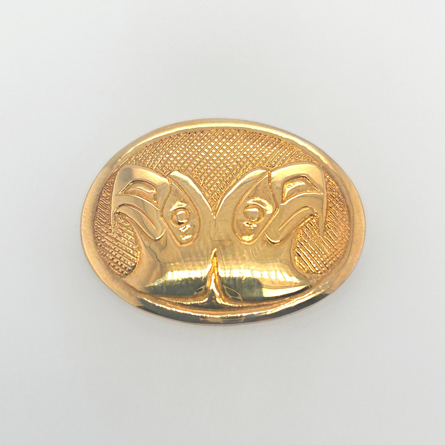Gold Eagles Brooch by Haida artist Carmen Goertzen