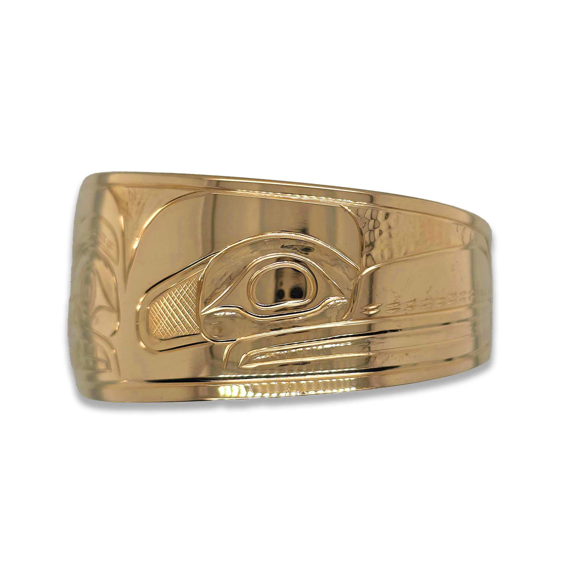 Gold Orca and Raven Bracelet by Coast Salish/Kwakwaka'wakw artist Noel Brown