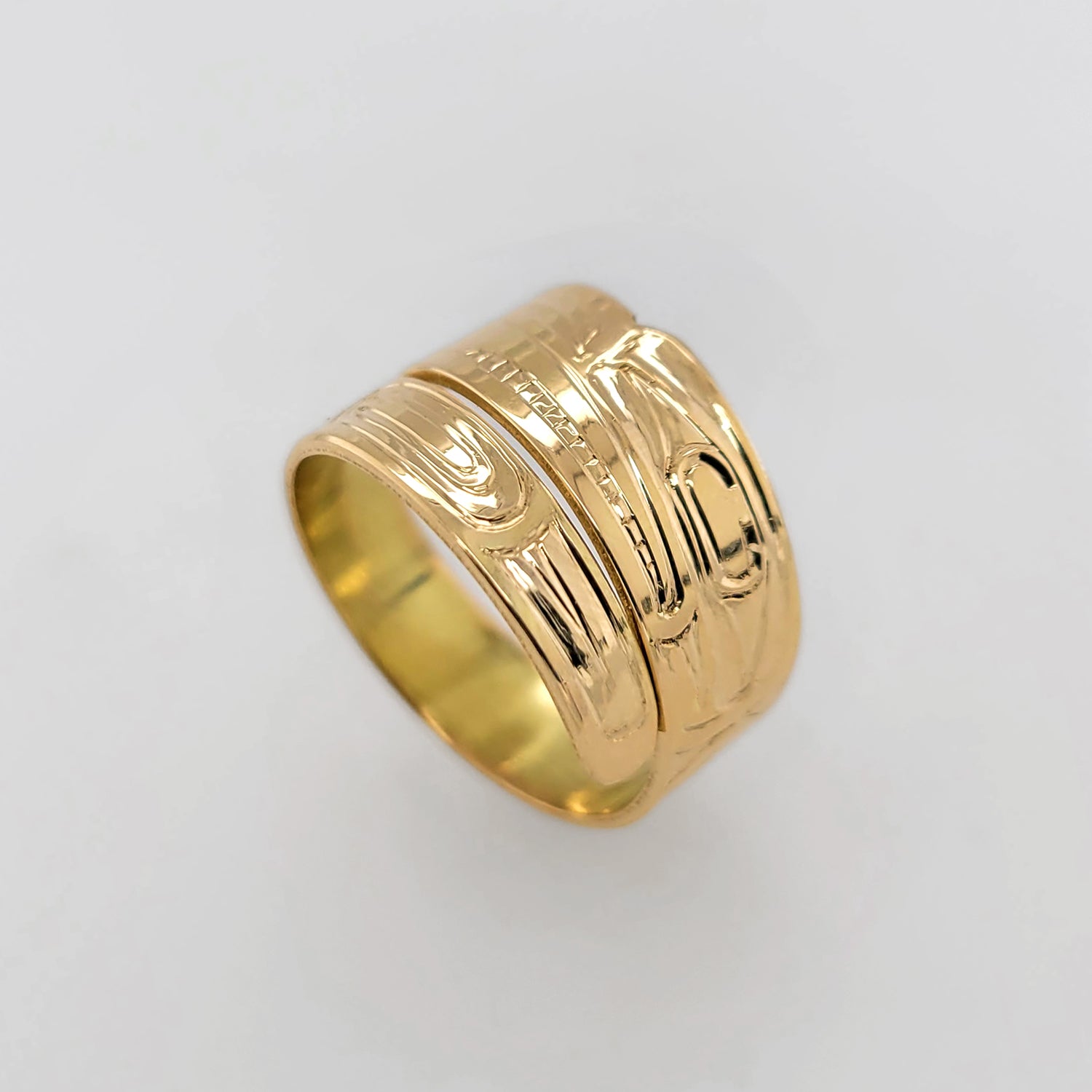 Gold Raven Steals the Light Wrap Ring by Haida artist Garner Moody