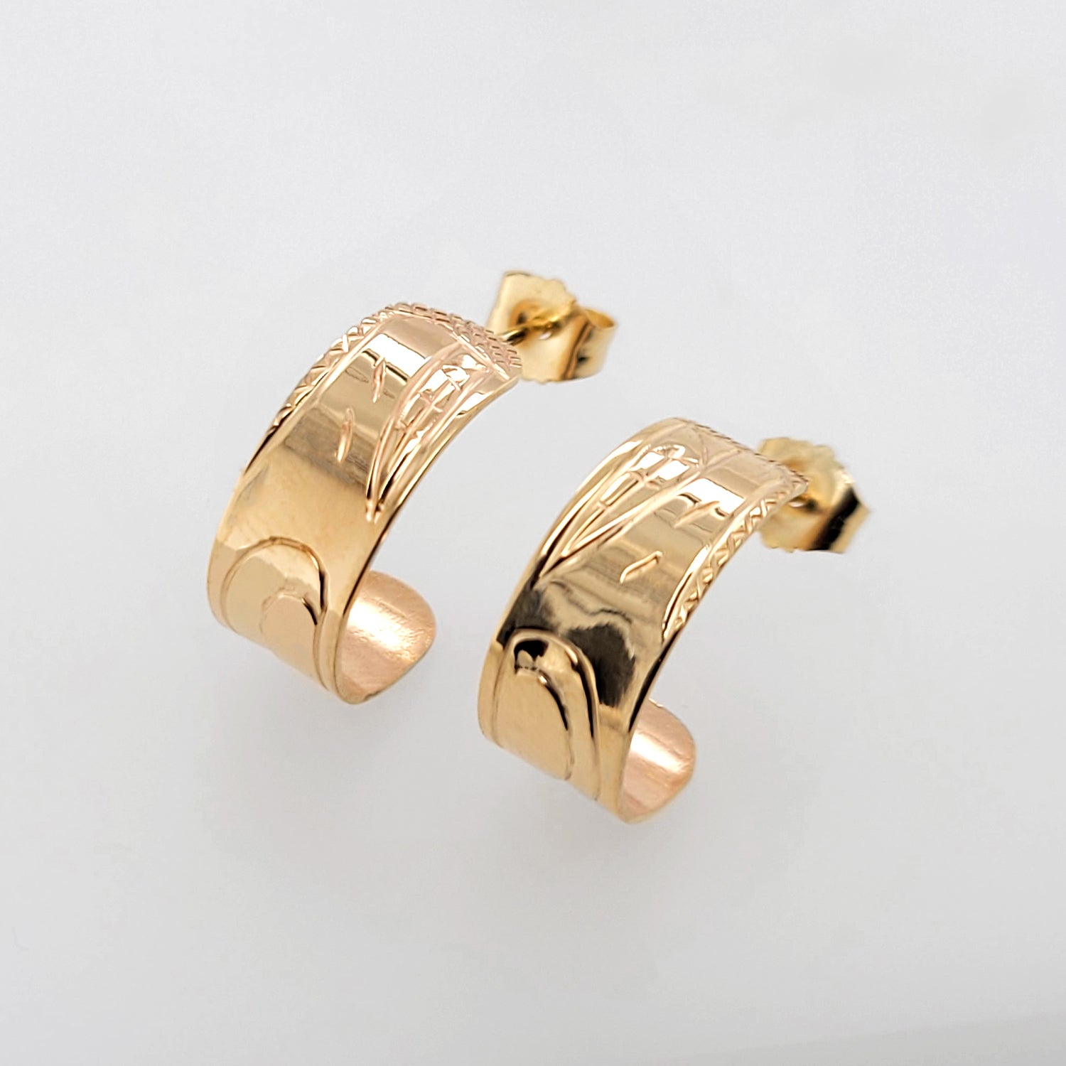 Gold Wolf Earrings by Cree artist Justin Rivard