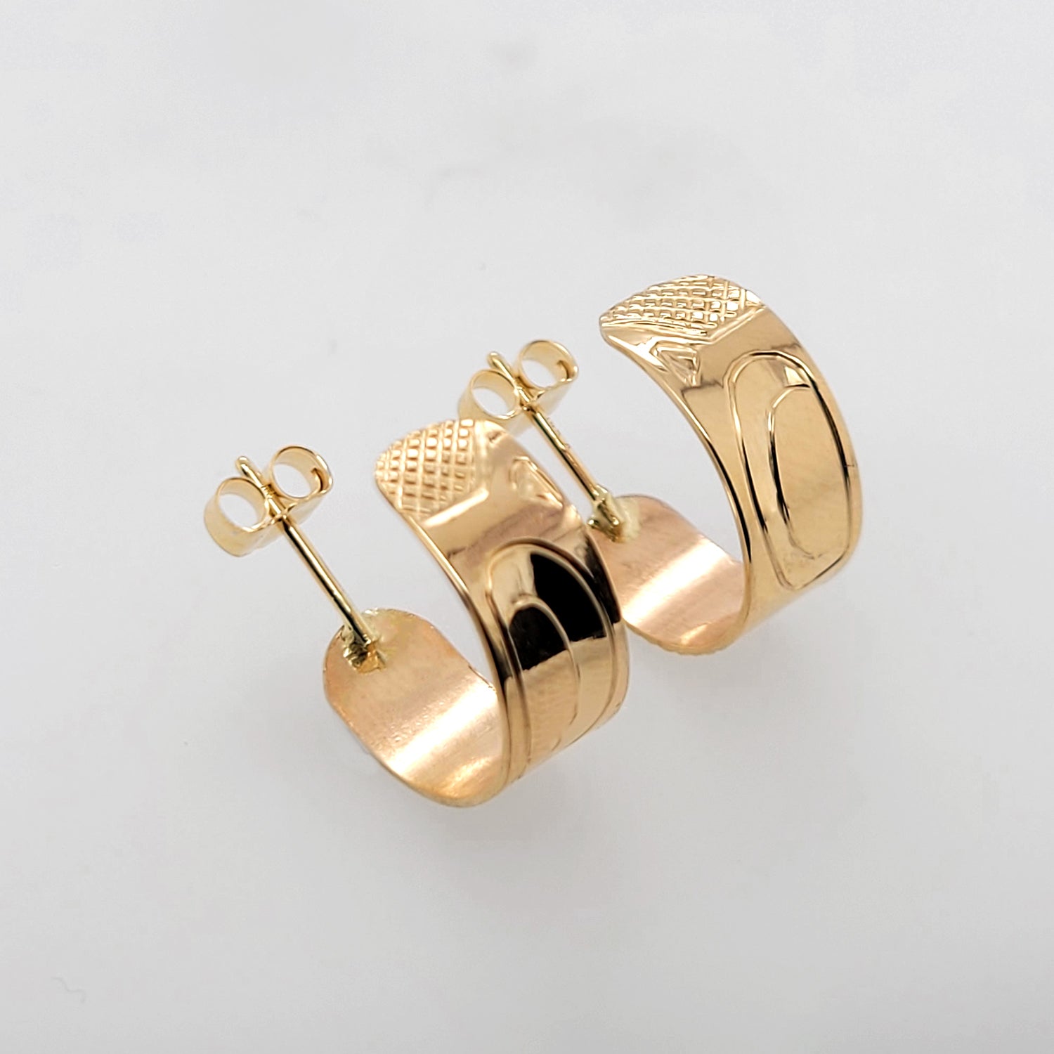 Gold Wolf Earrings by Cree artist Justin Rivard