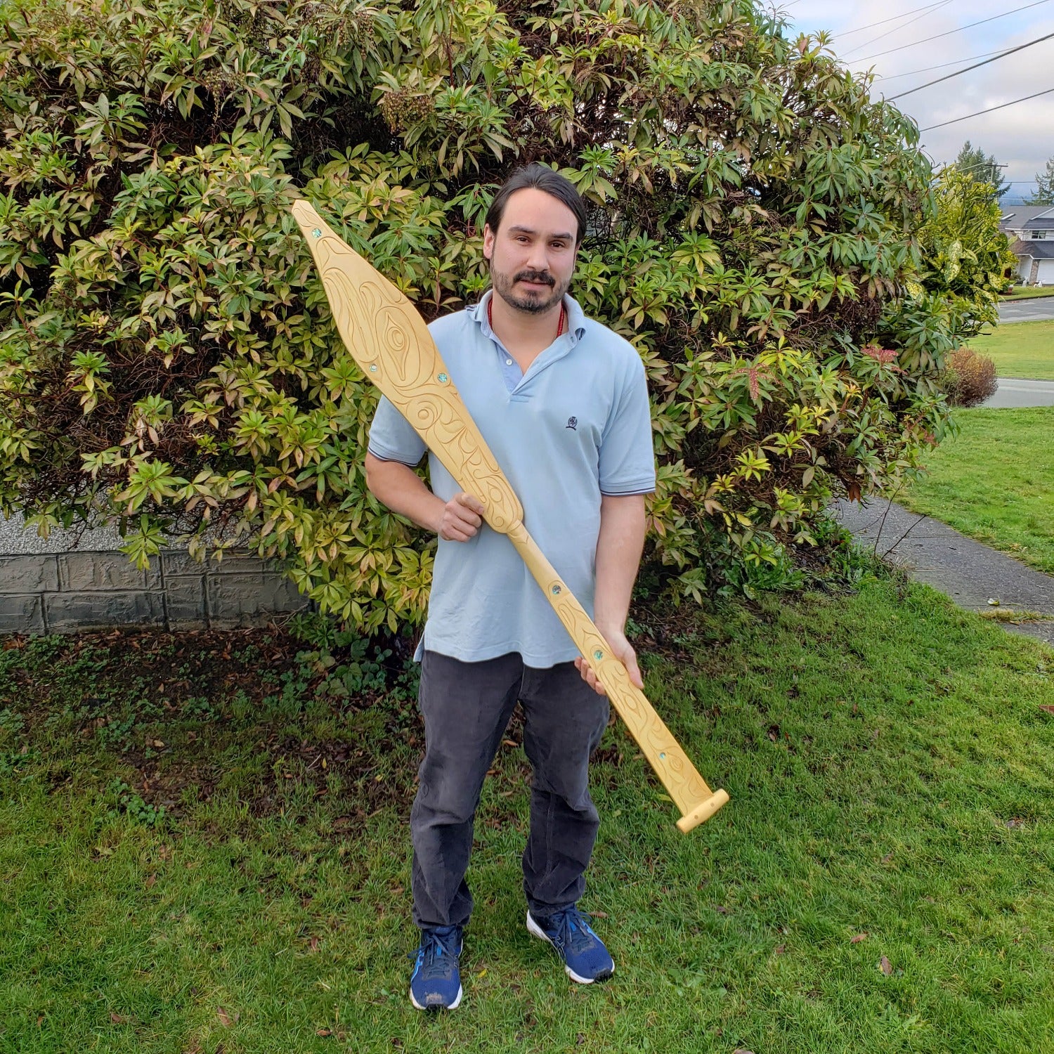 Double-sided cedar paddle hand-carved by Nuu-chah-nulth artist Joshua Shaw-Prescott