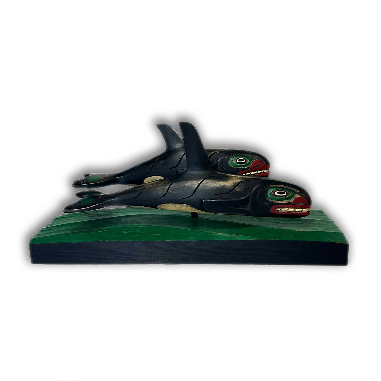 Killer Whales sculpture by Kwakwaka'wakw artist Greg Henderson