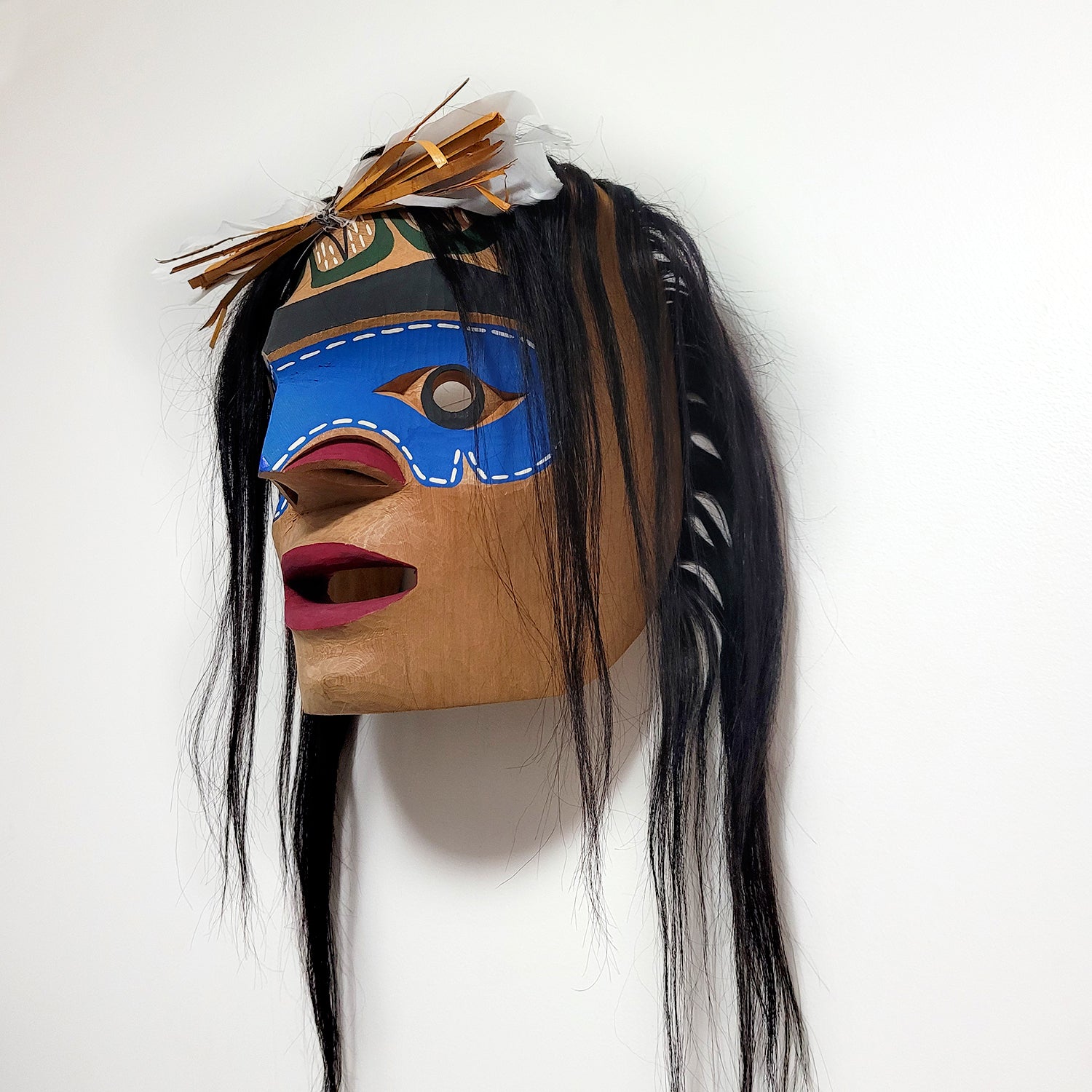 Man in Canoe Mask by Nuu-chah-nulth artist Russell Tate