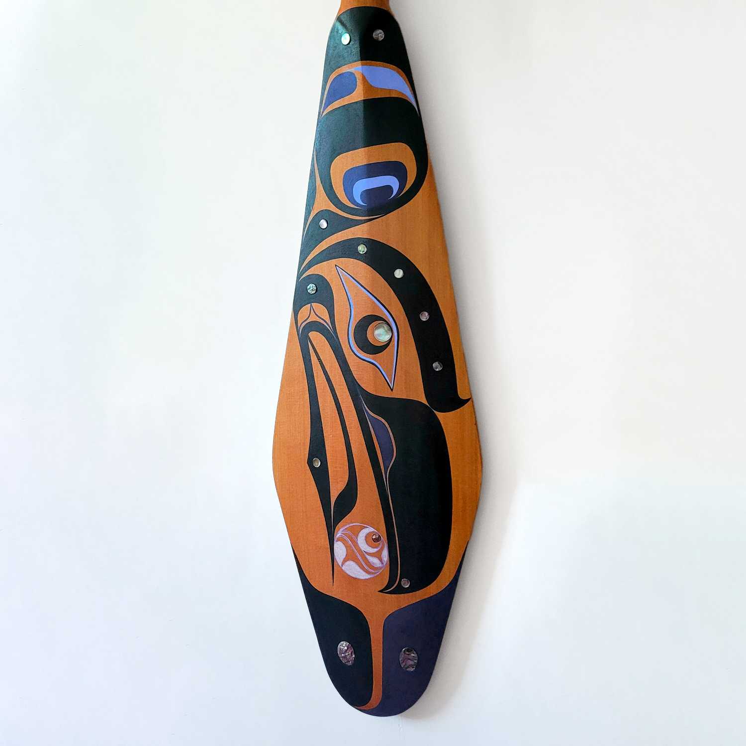 Raven Paddle by Kwakwaka'wakw artist Jessica Chickite