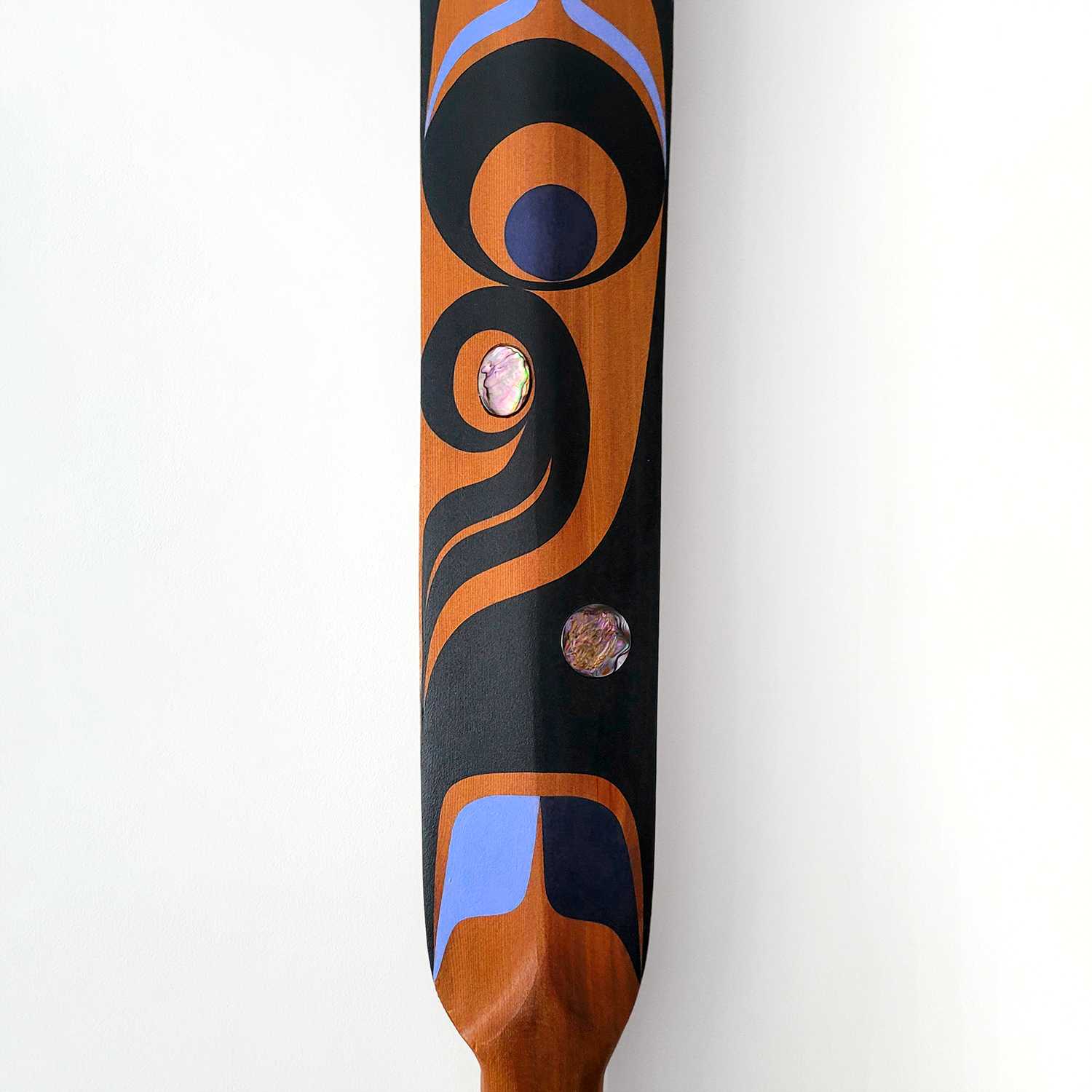 Raven Paddle by Kwakwaka'wakw artist Jessica Chickite
