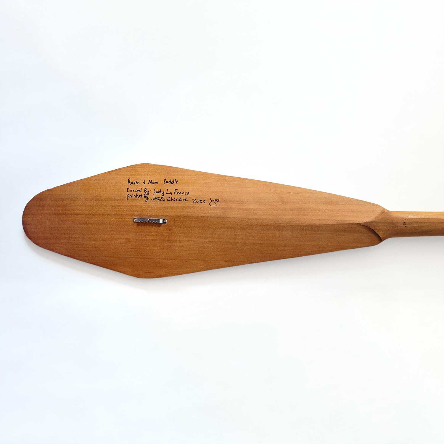 Raven Paddle by Kwakwaka'wakw artist Jessica Chickite