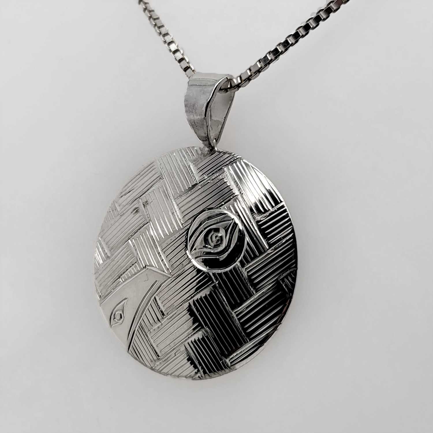 Silver Raven Pendant by Coast Salish Artist Jody Sparrow