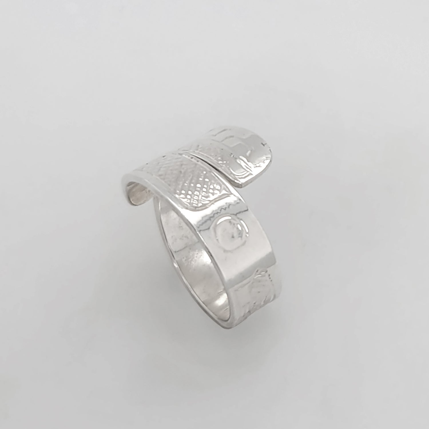 Silver Raven Steals the Light Wrap Ring by Tahltan artist Terrence Campbell