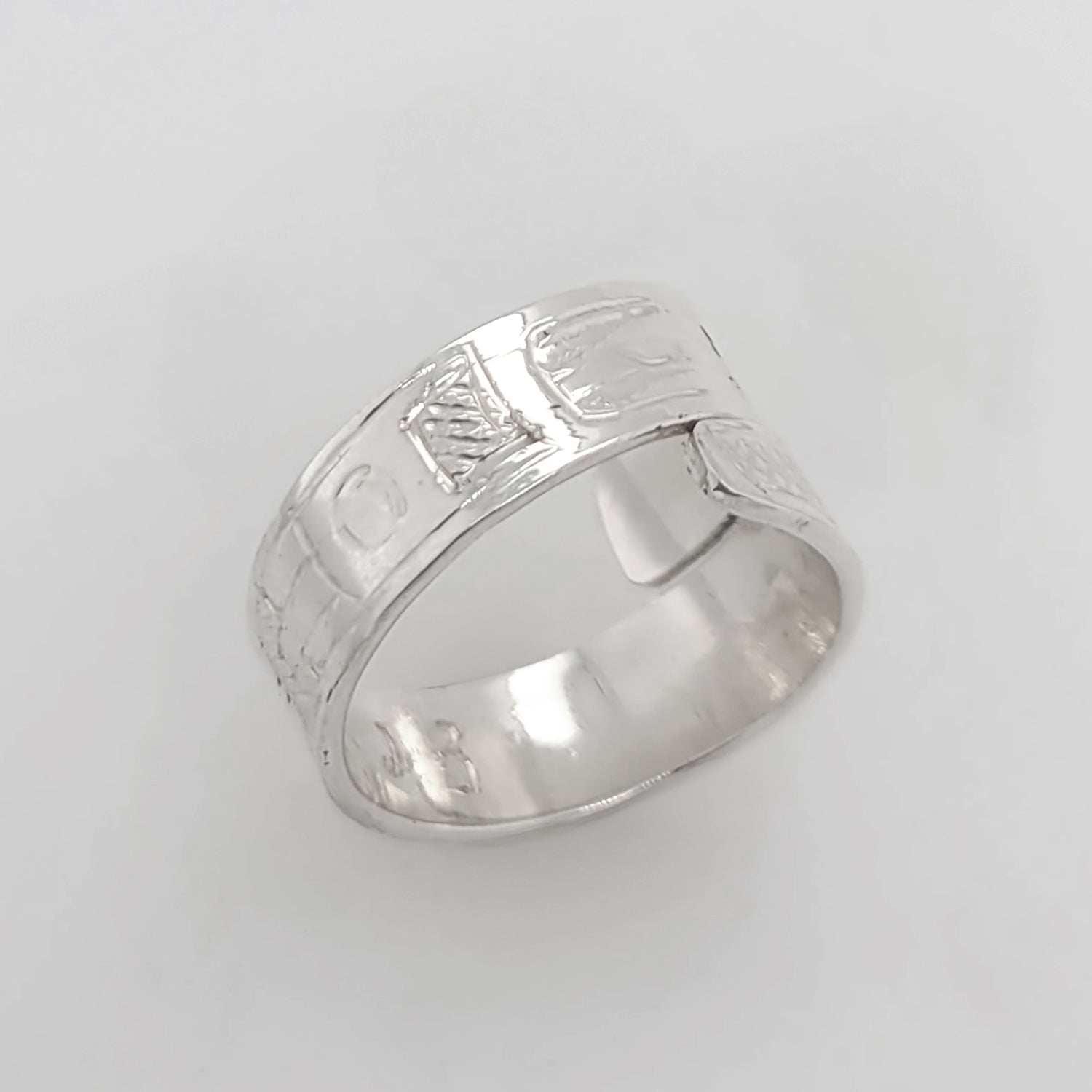 Silver Raven Steals the Light Wrap Ring by Tahltan artist Terrence Campbell