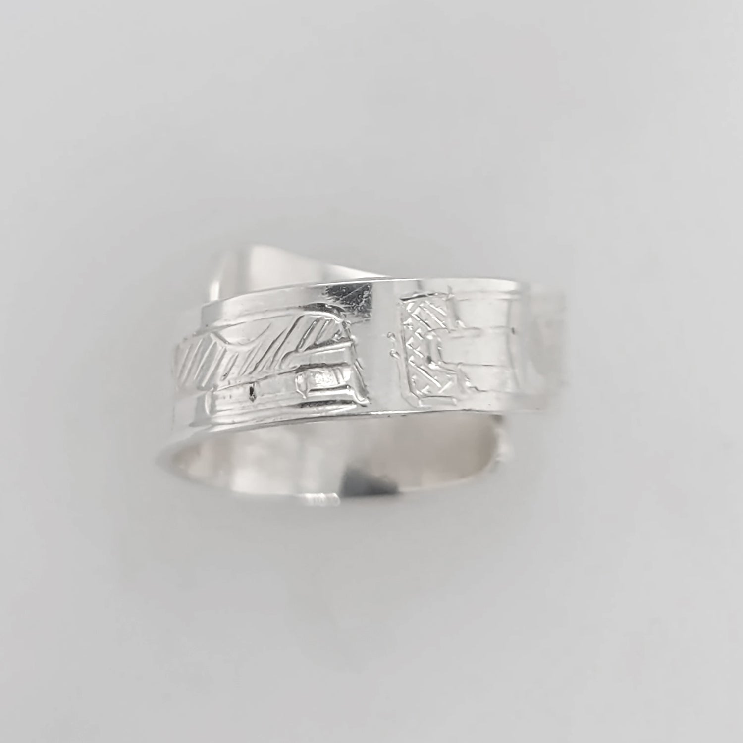 Silver Raven Steals the Light Wrap Ring by Tahltan artist Terrence Campbell