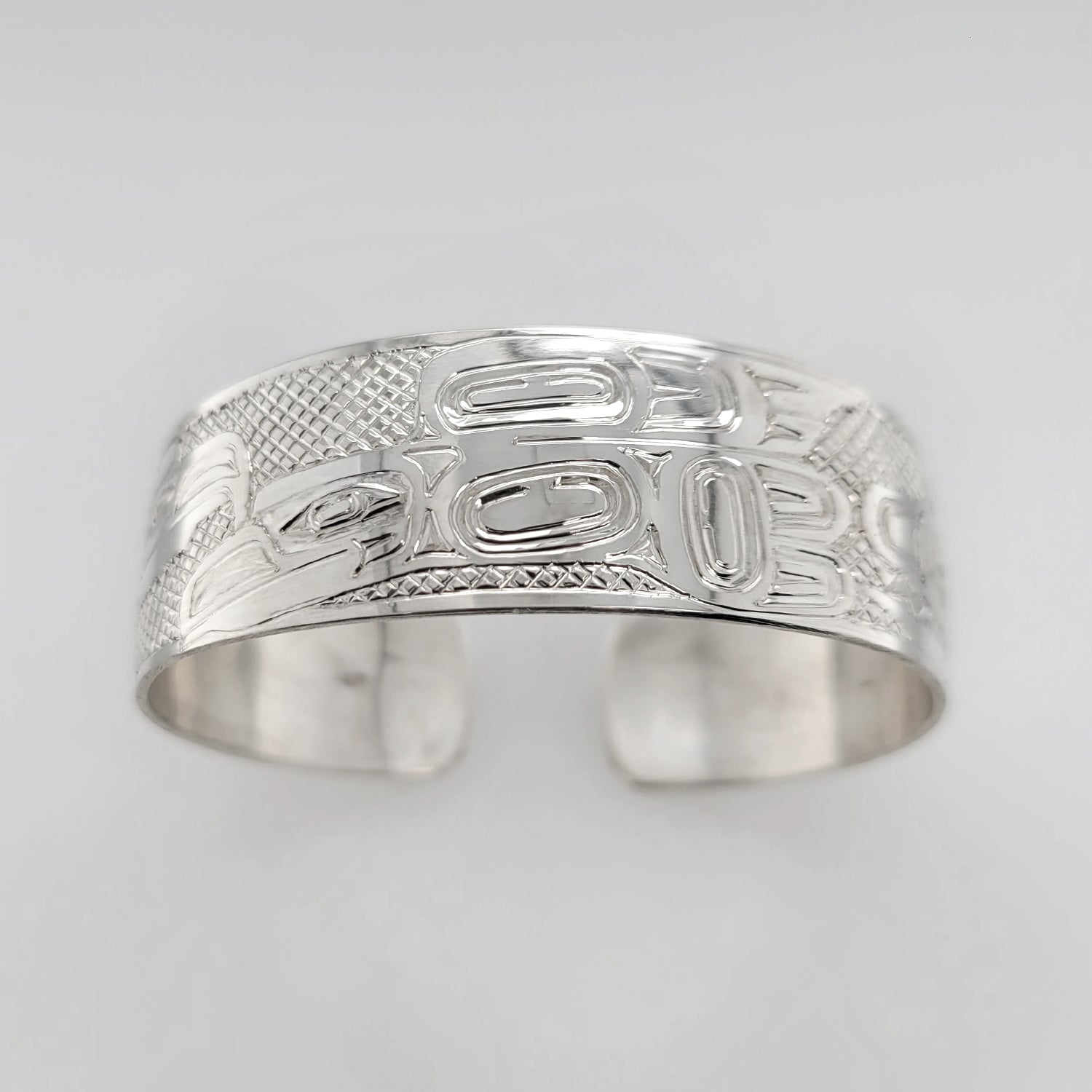 Silver Eagle, Raven, and Orca Bracelet by Haida artist Garner Moody