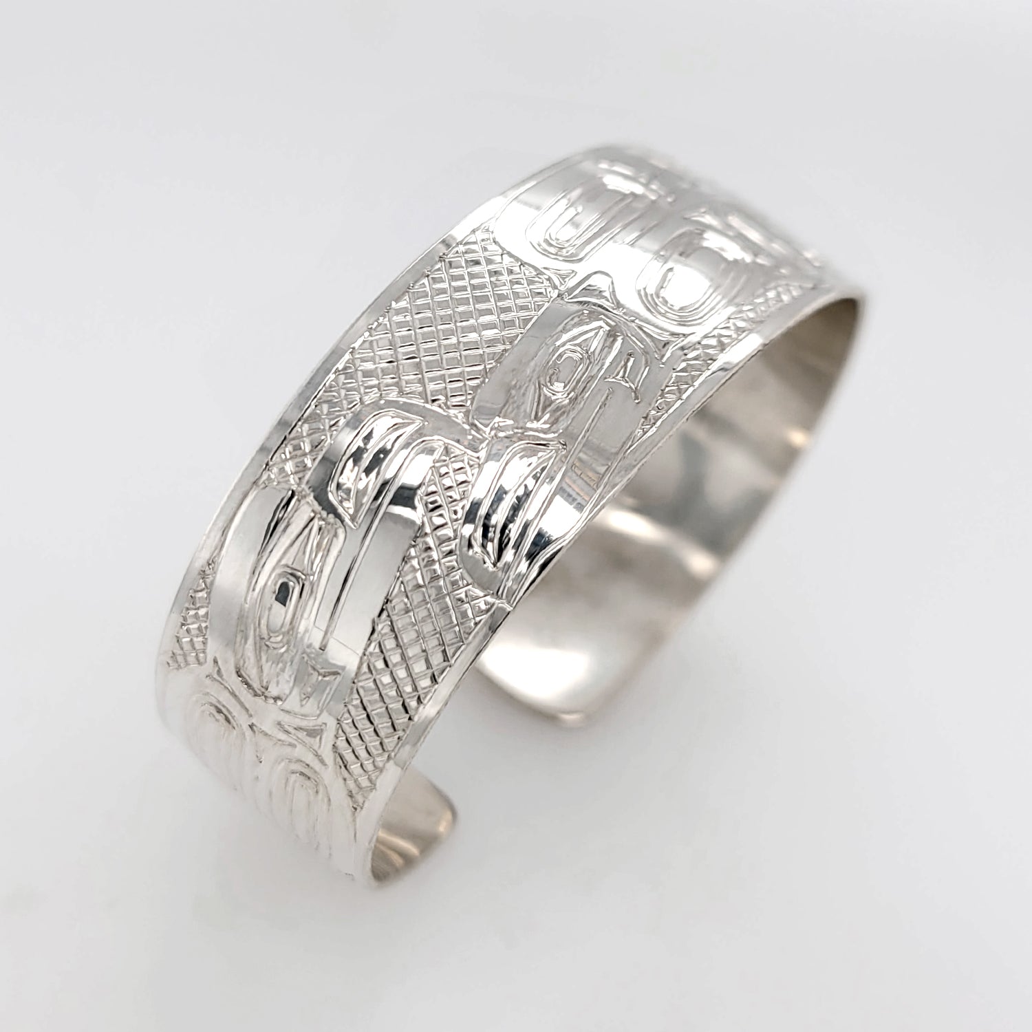 Silver Eagle, Raven, and Orca Bracelet by Haida artist Garner Moody