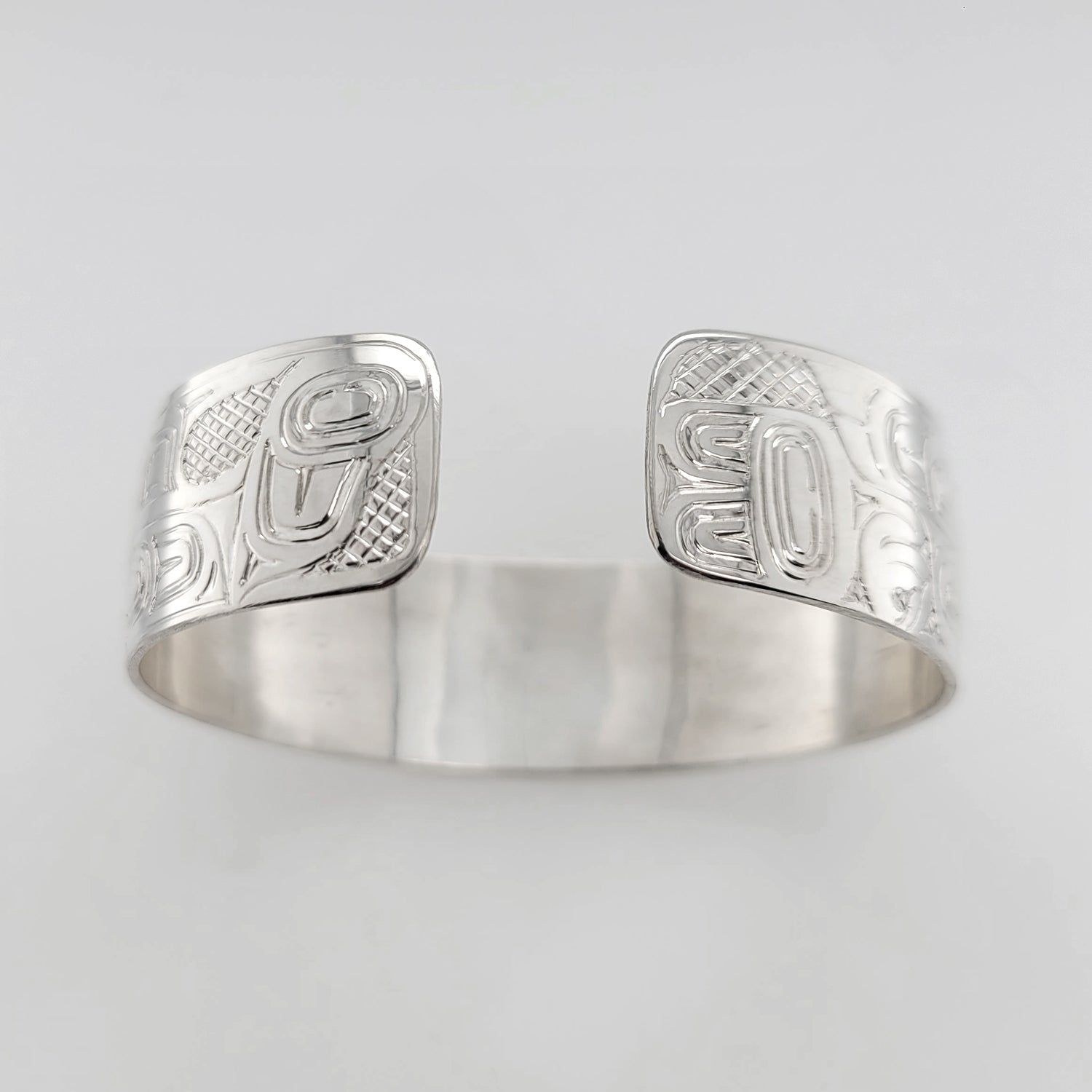 Silver Eagle, Raven, and Orca Bracelet by Haida artist Garner Moody