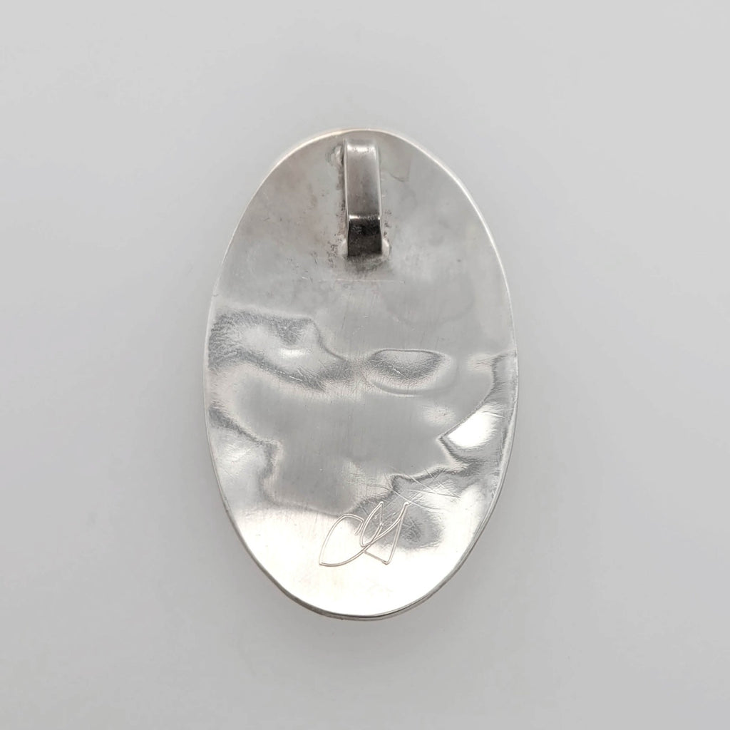Indigenous Silver Hummingbird Pendant by Haida artist Carmen Goertzen