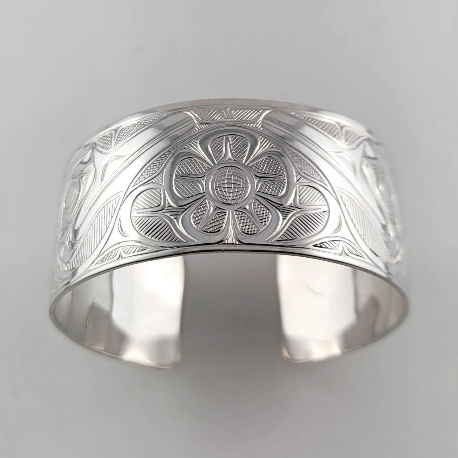 Silver Hummingbirds Bracelet by Indigenous artist Joe Wilson