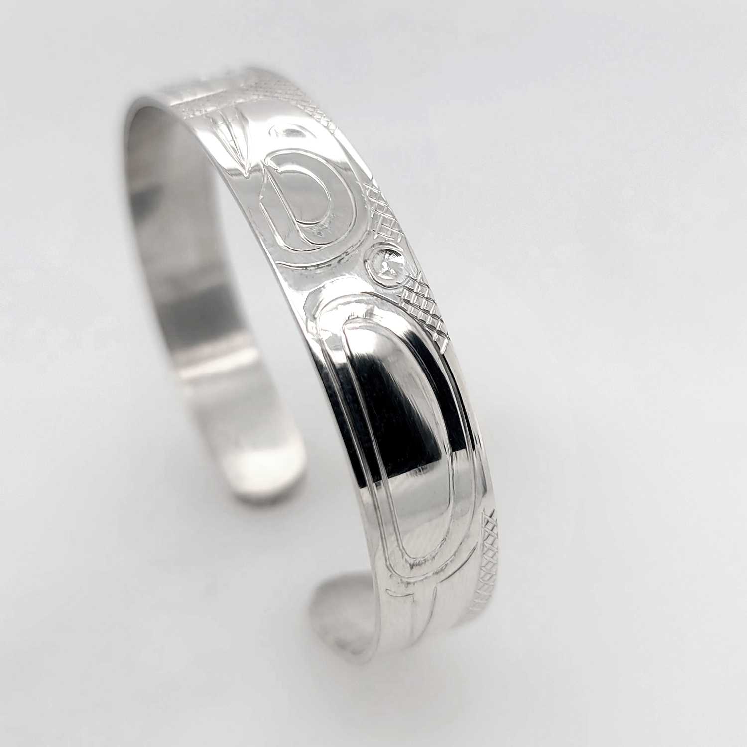 Silver Orca Bracelet hand-carved by Cree artist Justin Rivard