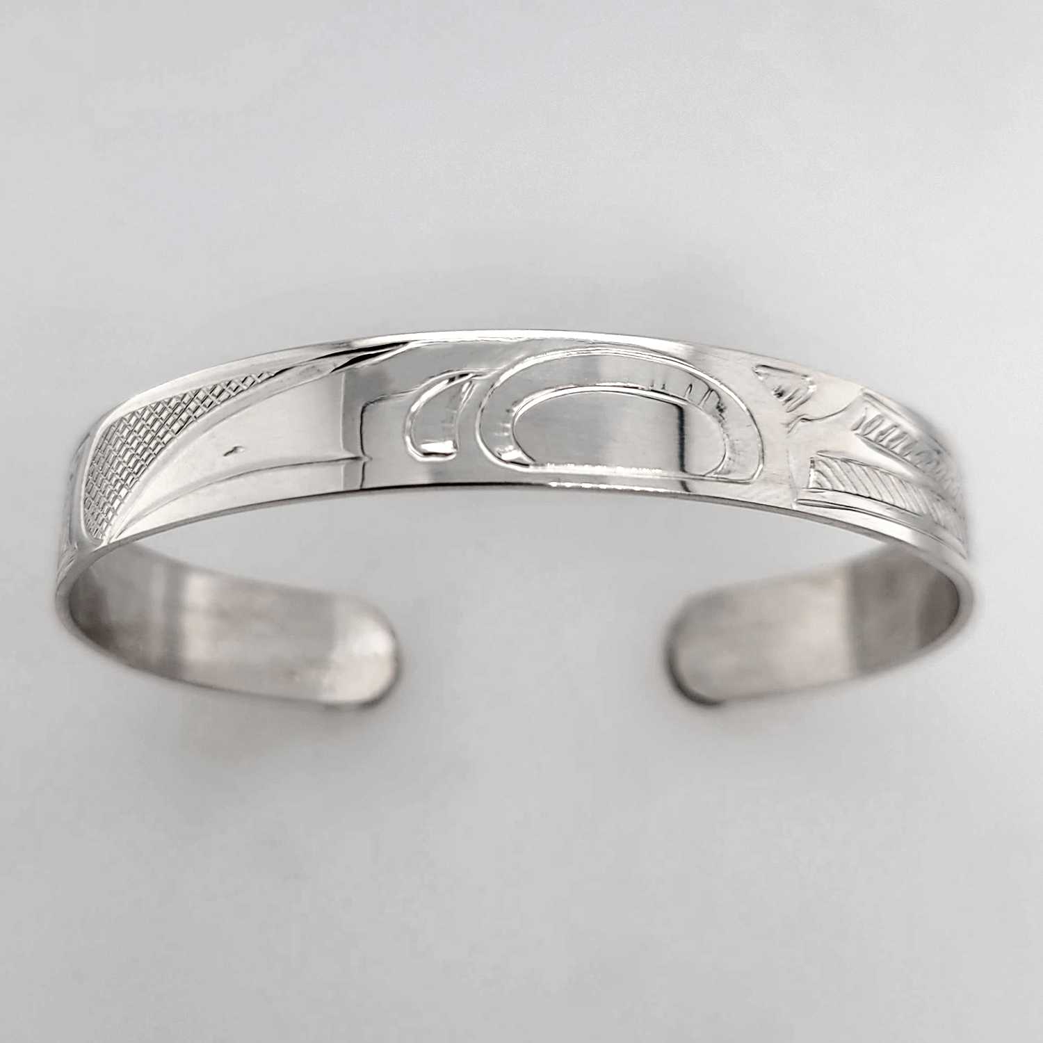 Silver Raven Bracelet hand-carved by Cree artist Justin Rivard