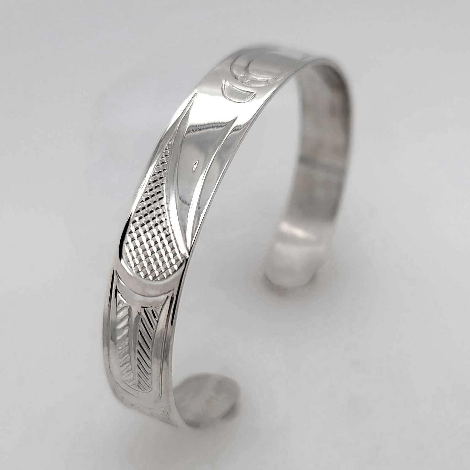 Silver Raven Bracelet hand-carved by Cree artist Justin Rivard