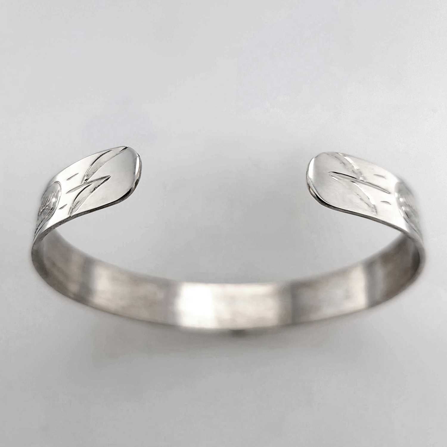 Silver Raven Bracelet hand-carved by Cree artist Justin Rivard