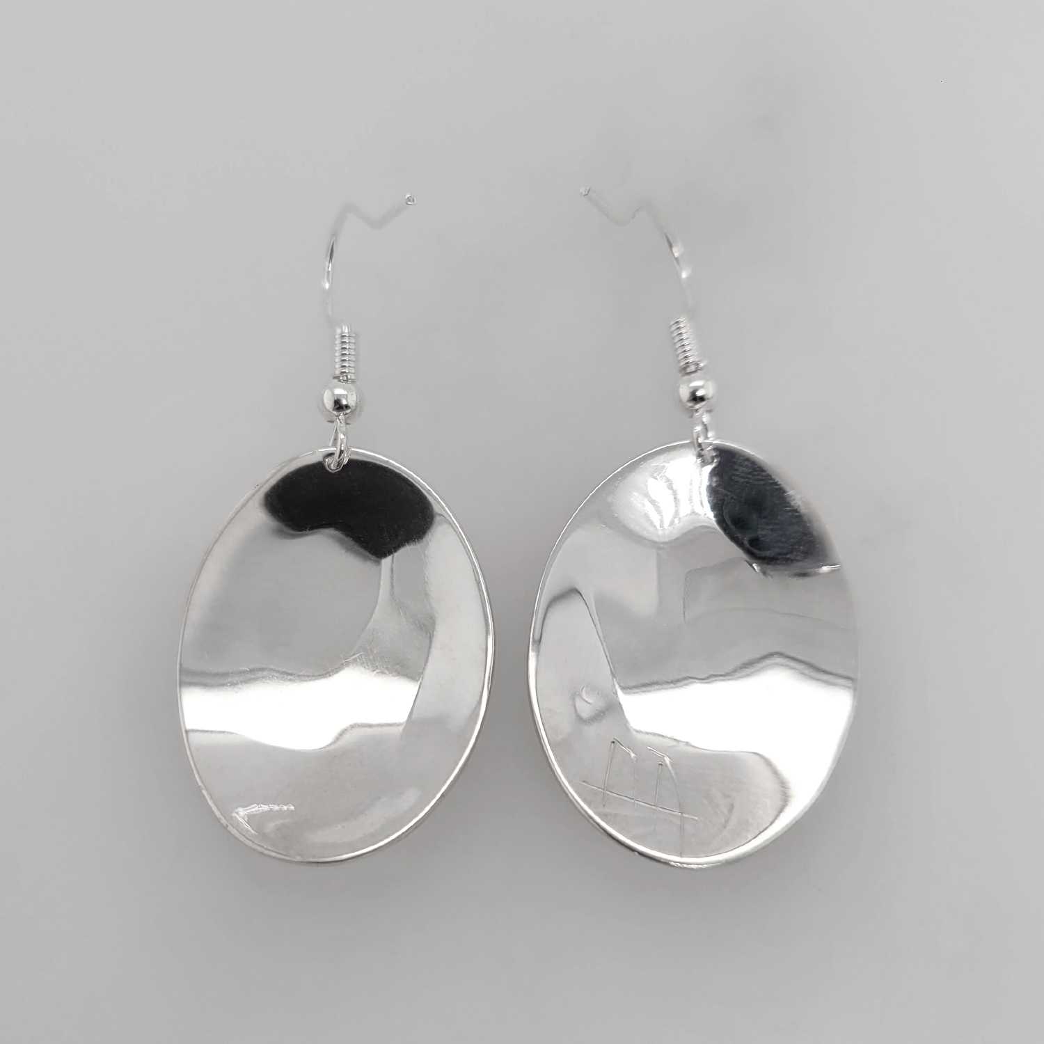 Silver Eagle Earrings by Haida artist Alvin Adkins