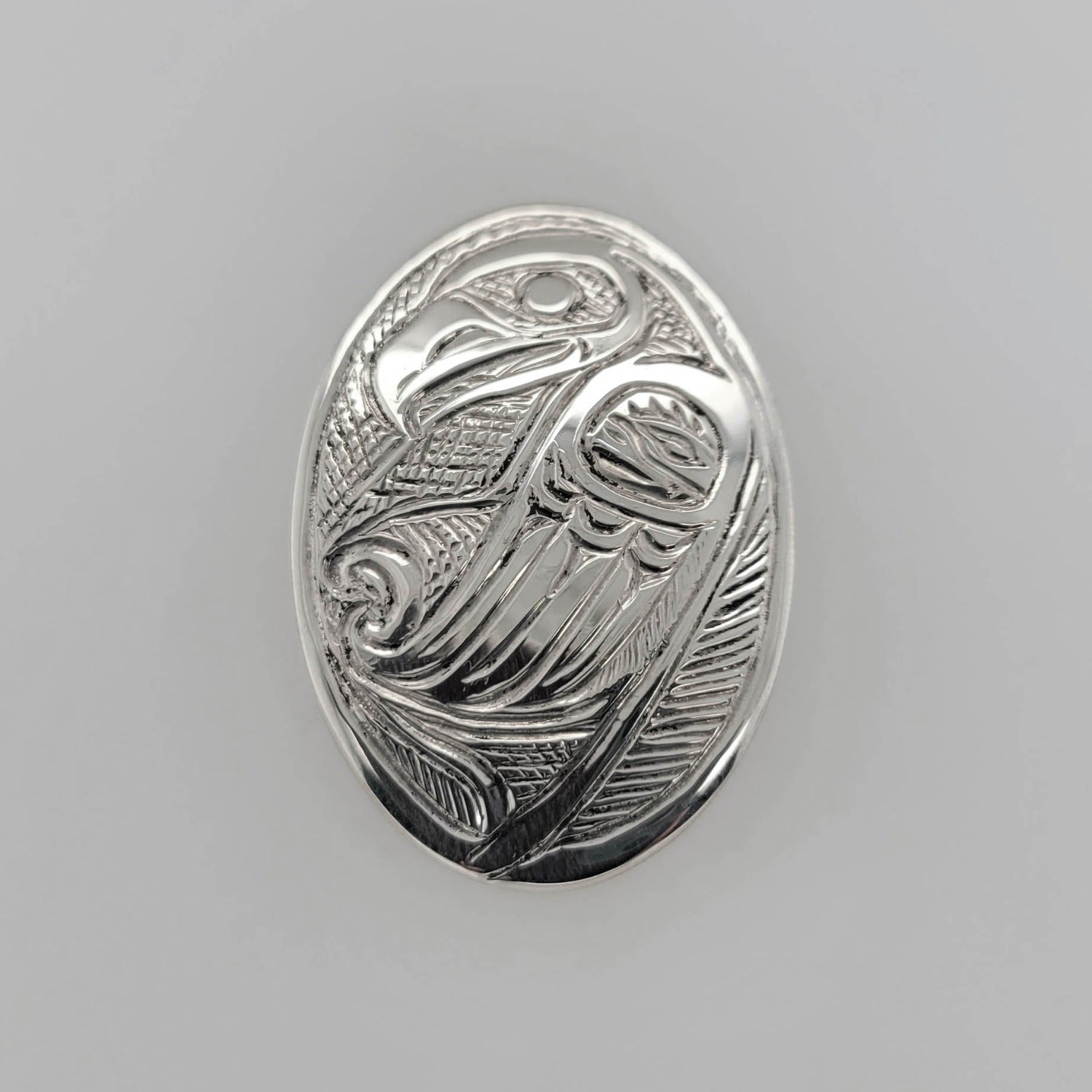 Silver Oval Eagle Pendant by Tsimshian artist Bill Helin