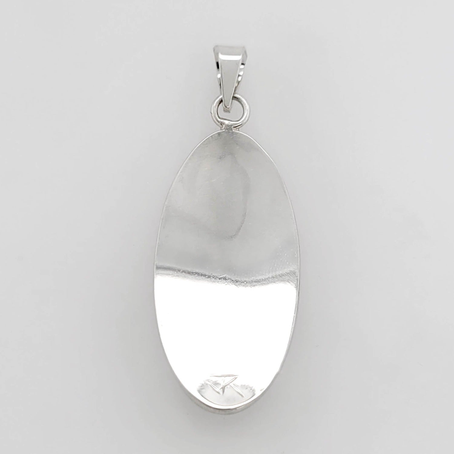 Silver Wolf Pendant by Cree artist Justin Rivard