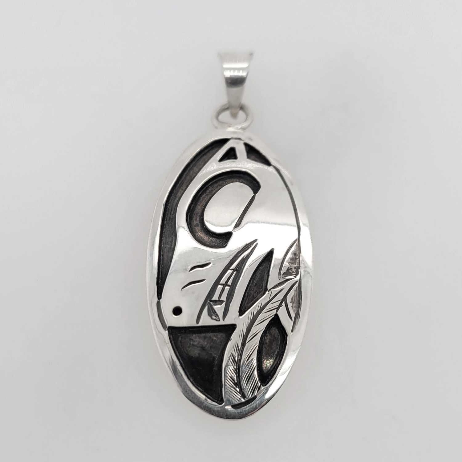 Oxidized Silver Wolf Pendant by Cree artist Justin Rivard