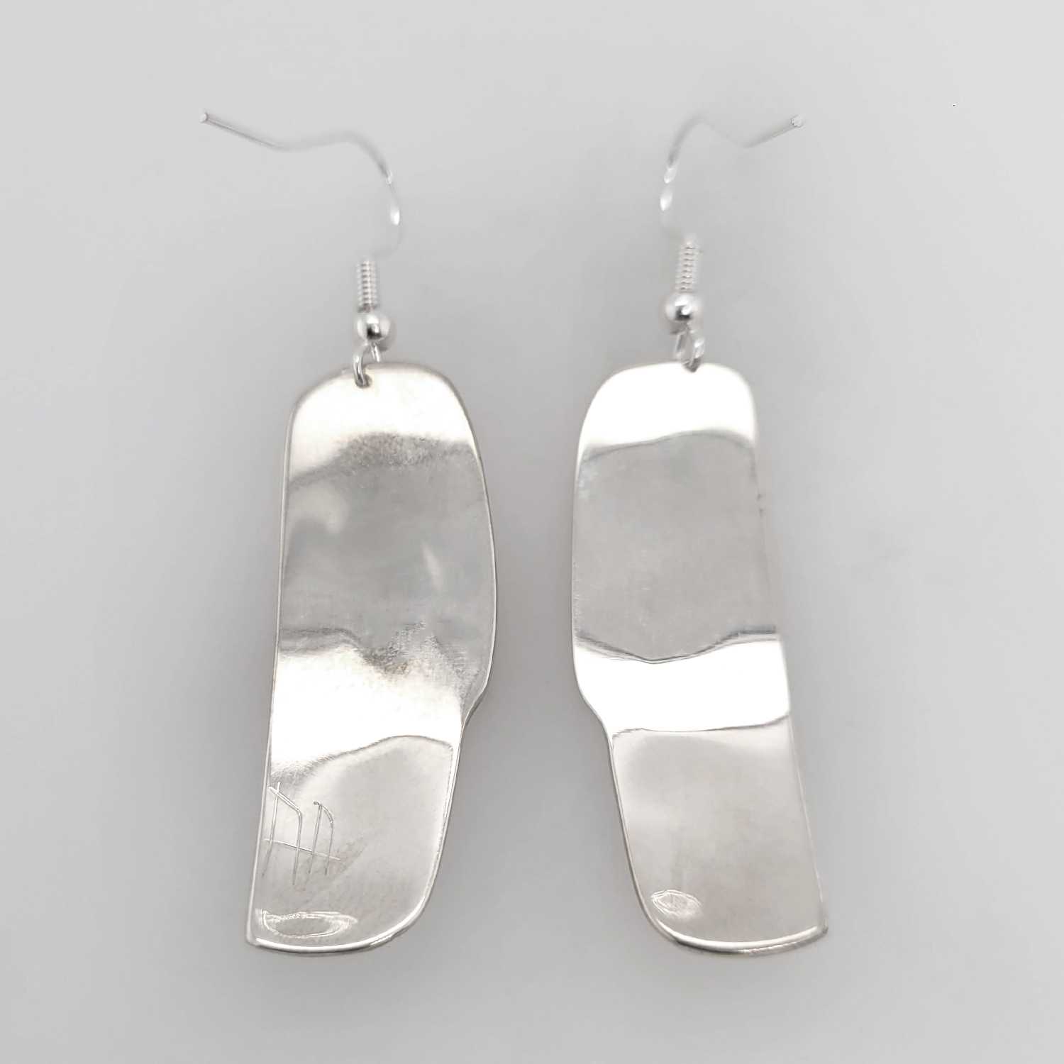 Silver Raven Earrings by Haida artist Alvin Adkins