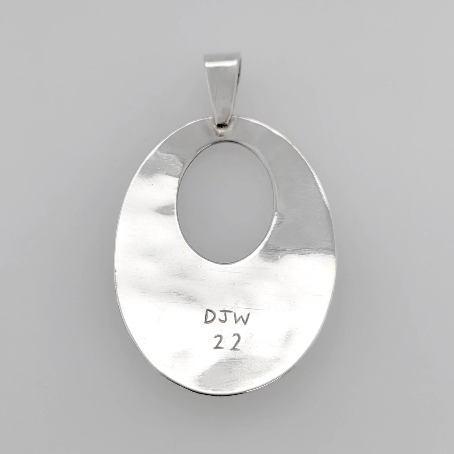 Silver Raven Pendant by Haida artist Derek White