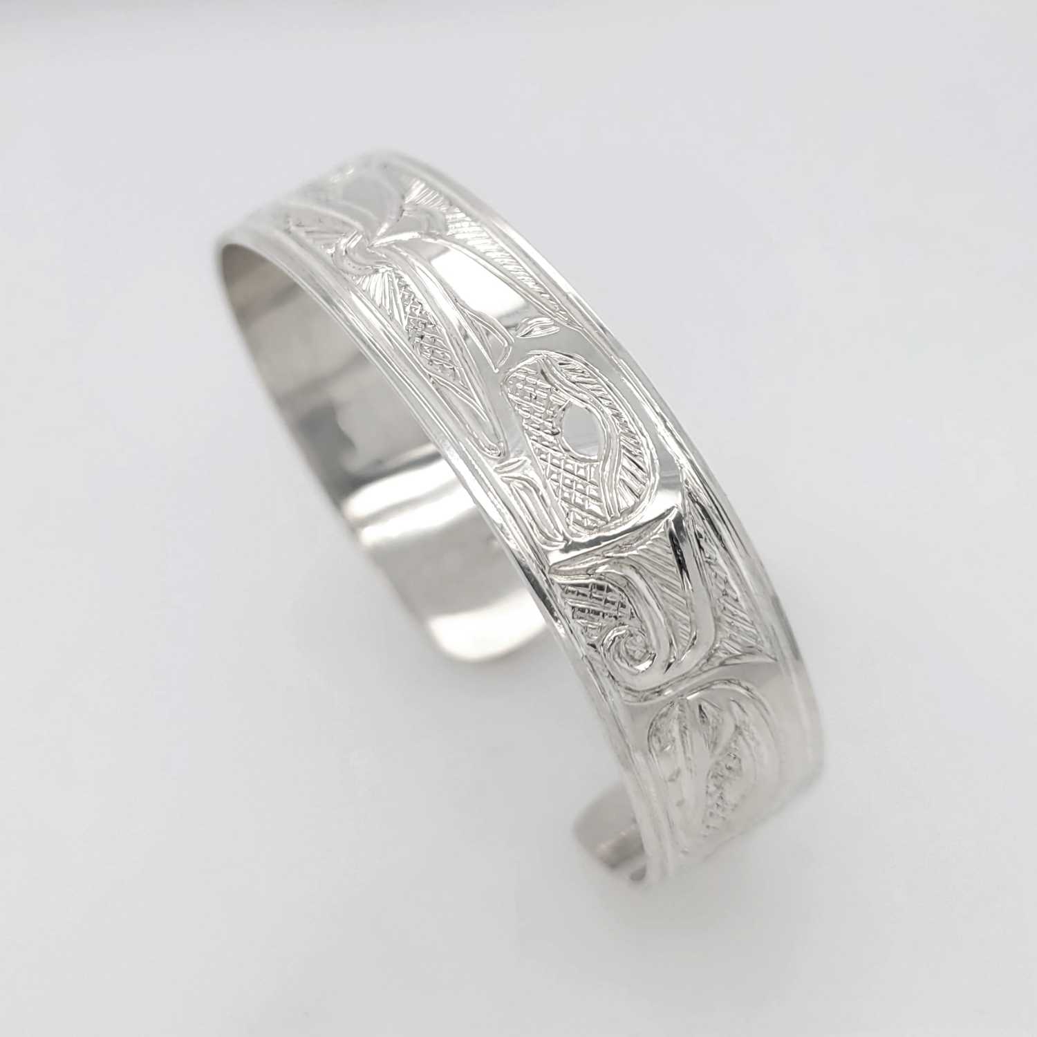 Silver Ravens Bracelet by Tsimshian artist Bill Helin