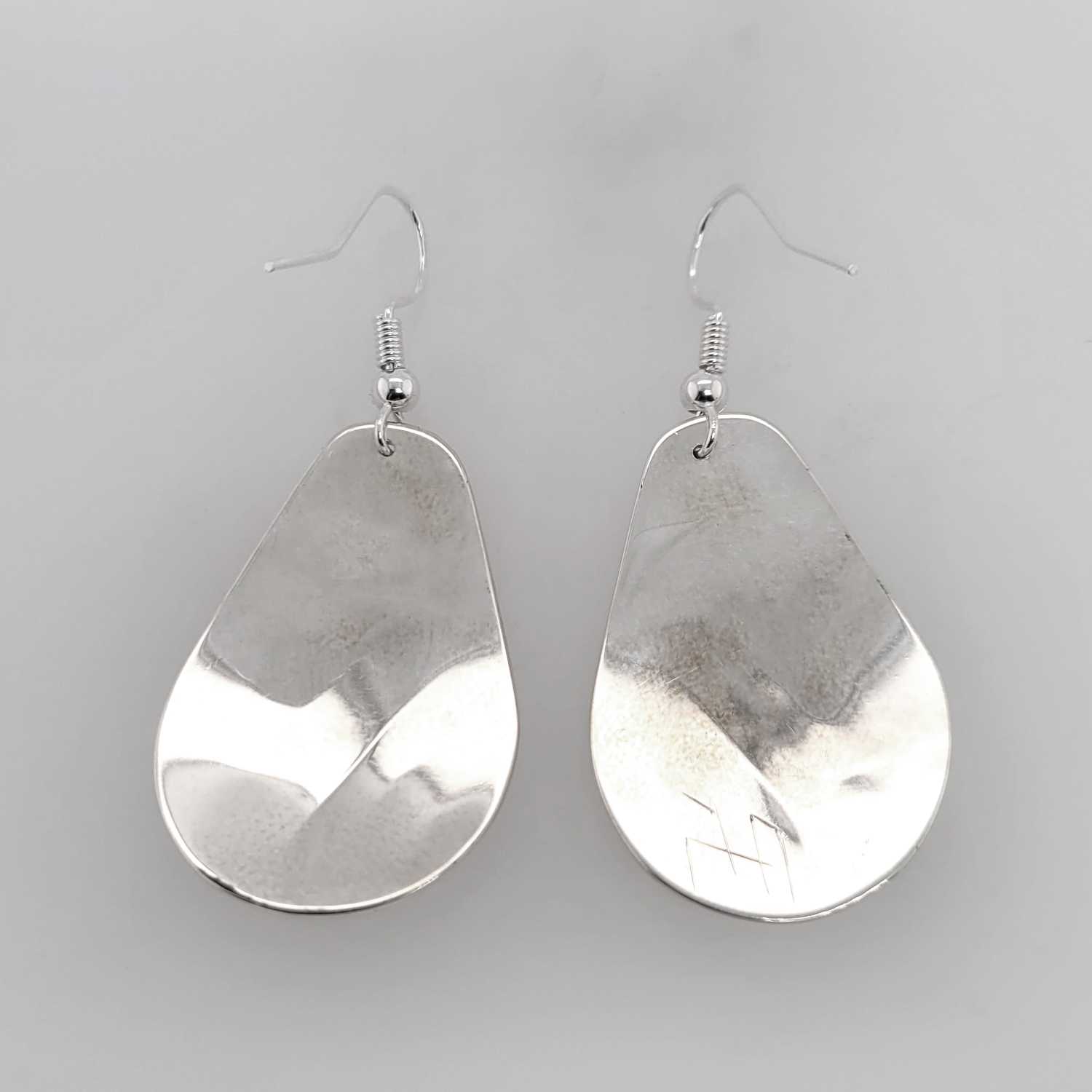 Silver Eagle Earrings by Haida artist Alvin Adkins