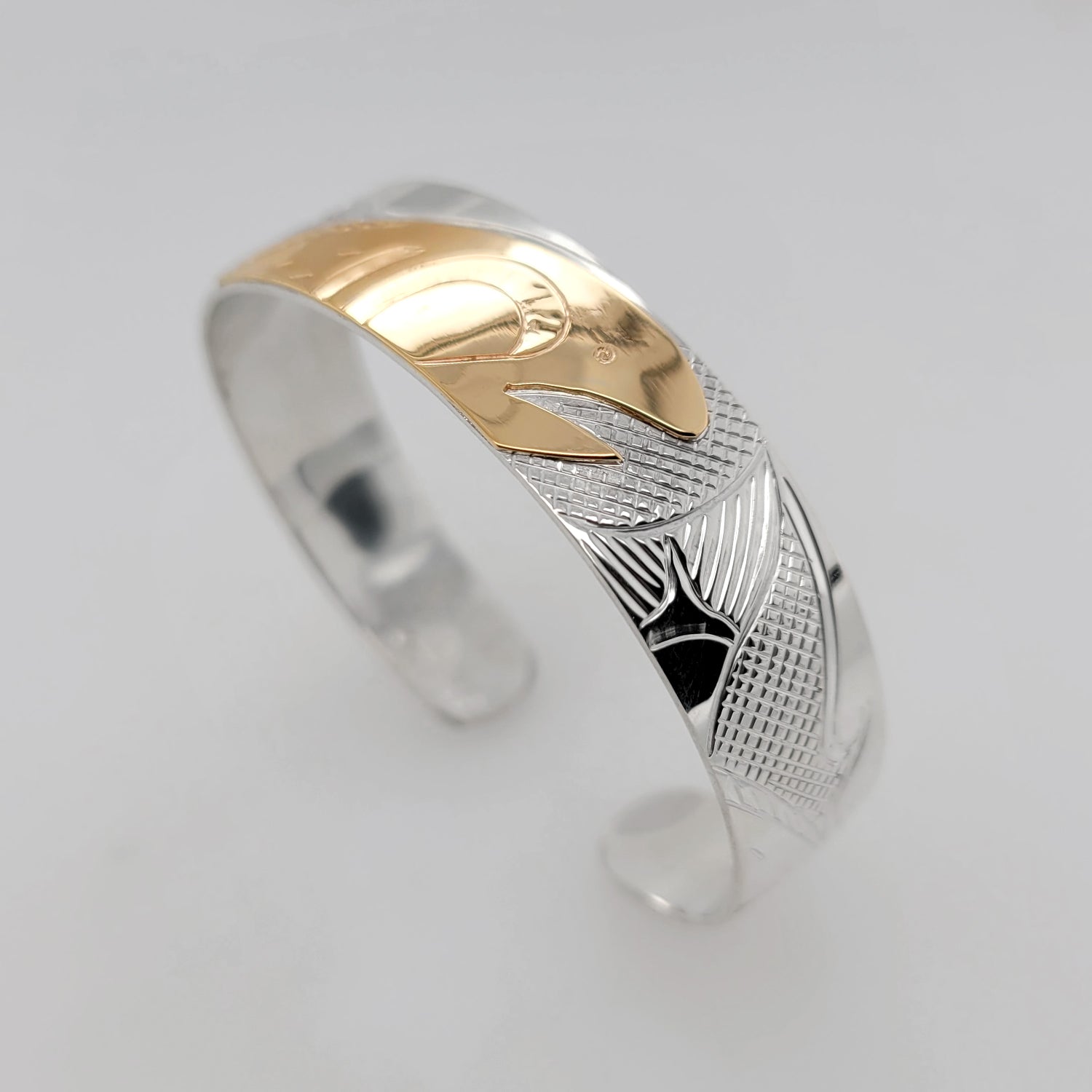 Silver and Gold Salmon Bracelet by Cree artist Justin Rivard