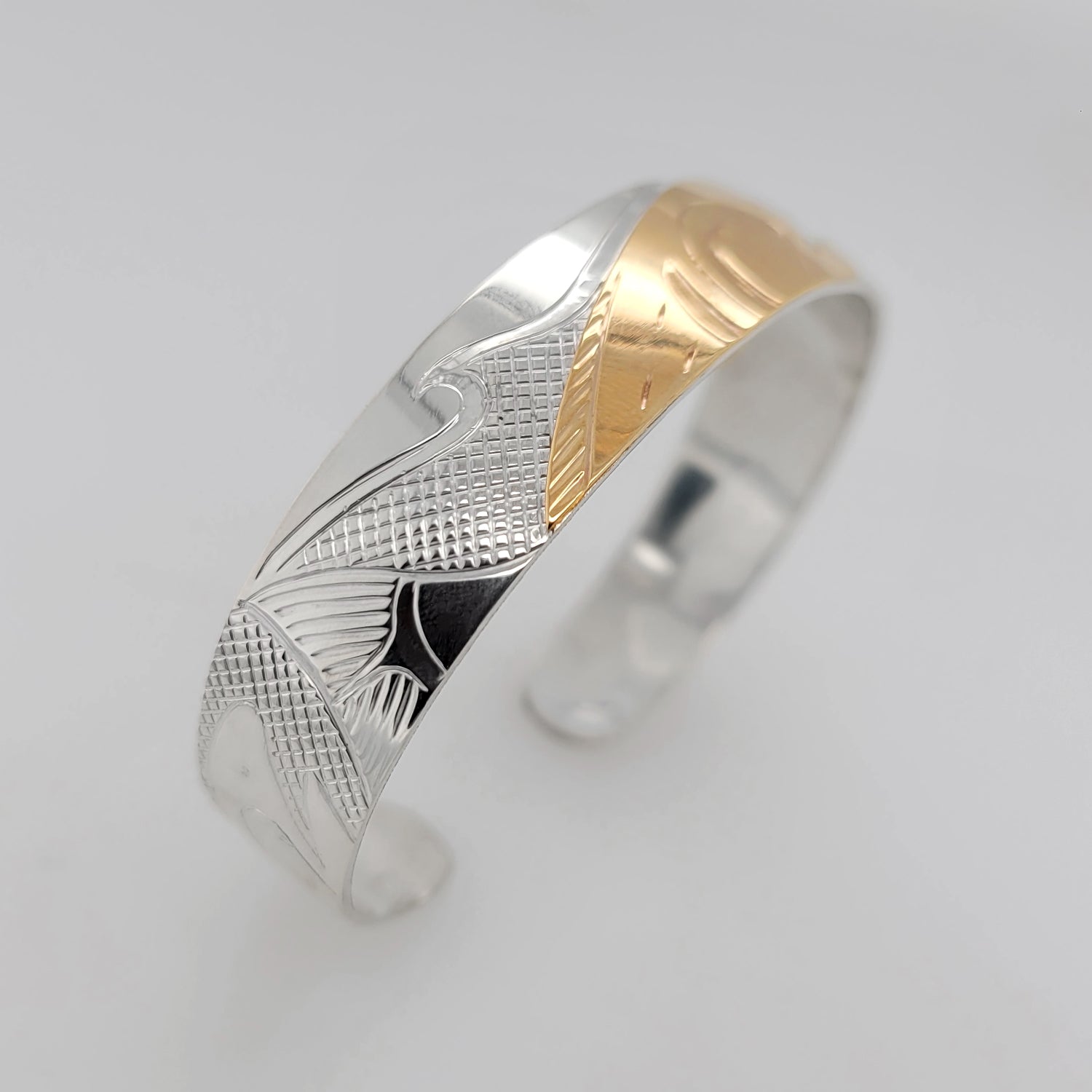 Silver and Gold Salmon Bracelet by Cree artist Justin Rivard