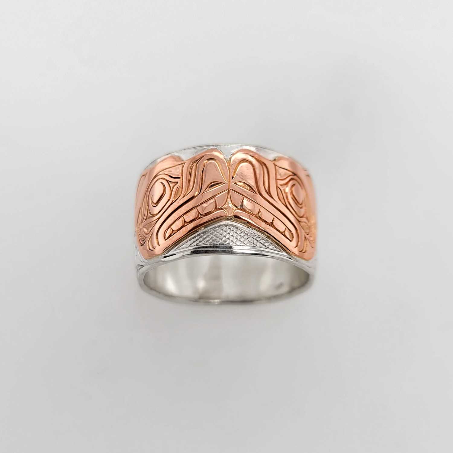 Silver and Rose Gold Otters Ring by Kwakwaka'wakw artist Joe Wilson