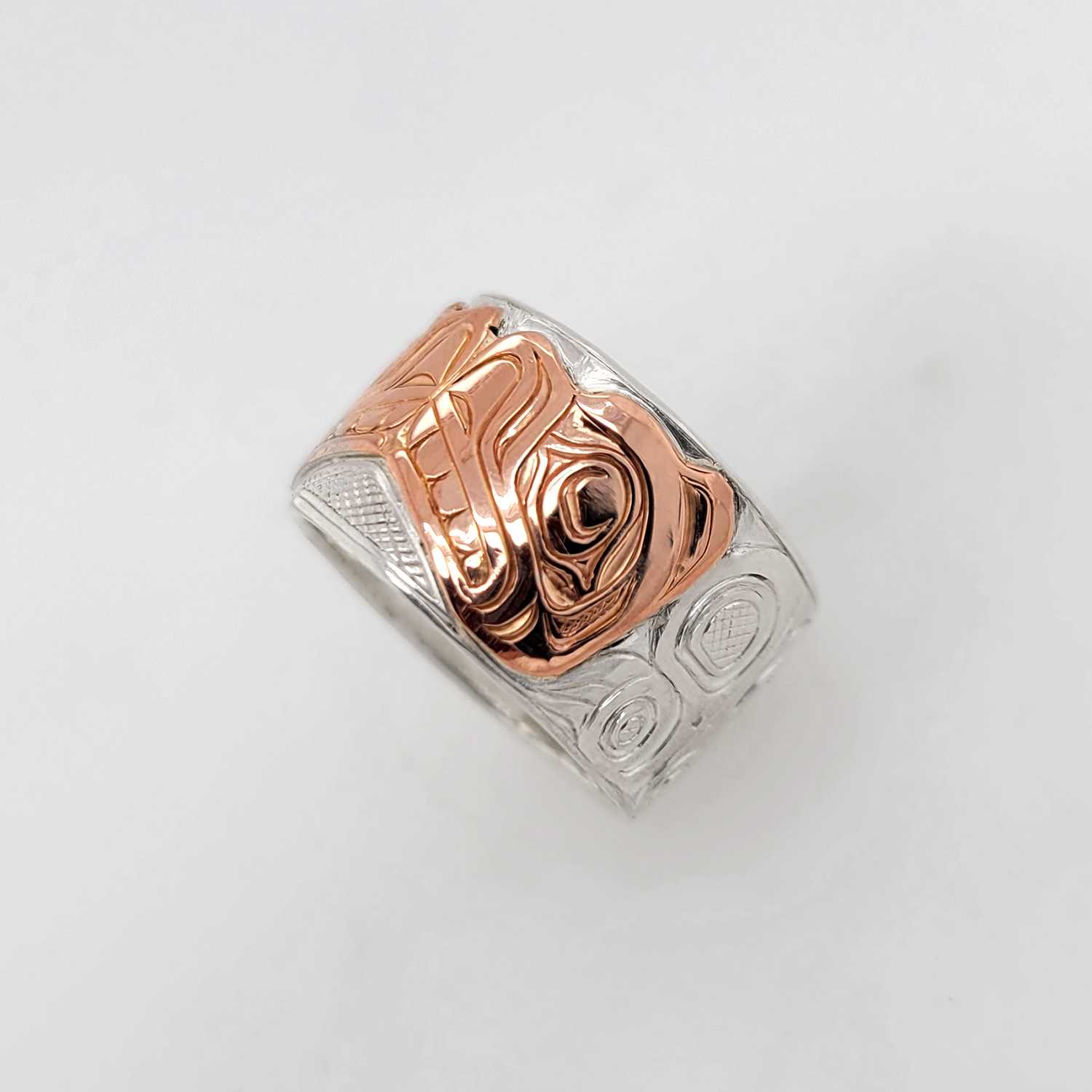 Silver and Rose Gold Otters Ring by Kwakwaka'wakw artist Joe Wilson
